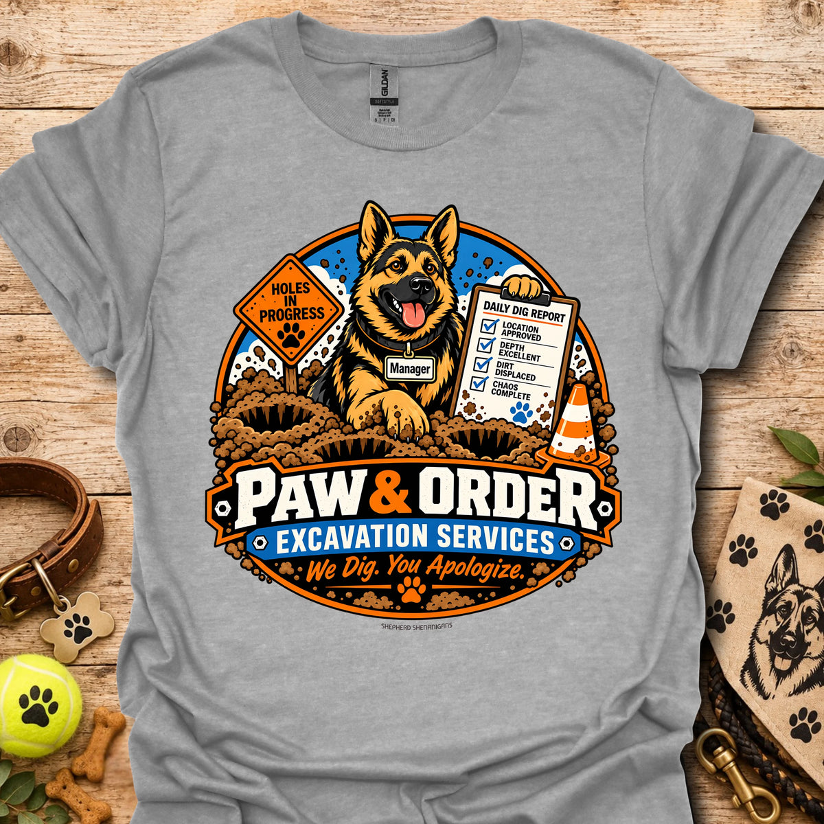 Sport grey Paw & Order excavation T-shirt with dog digging emblem and “We Dig You Apologize” text