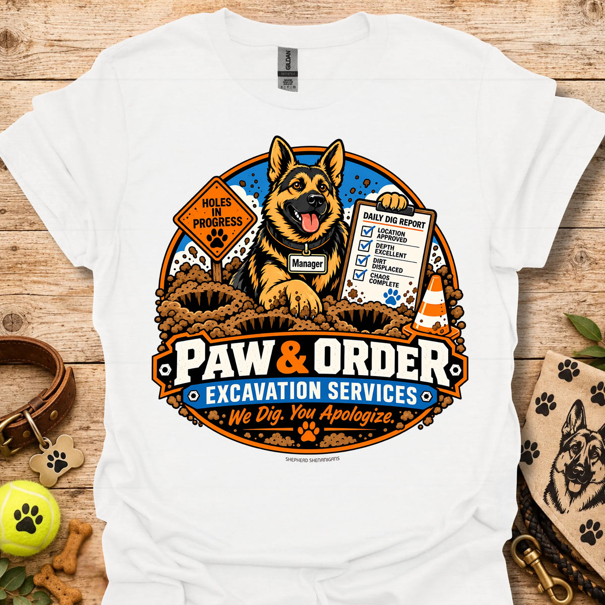 White Paw & Order excavation T-shirt with dog digging emblem and “We Dig You Apologize” text