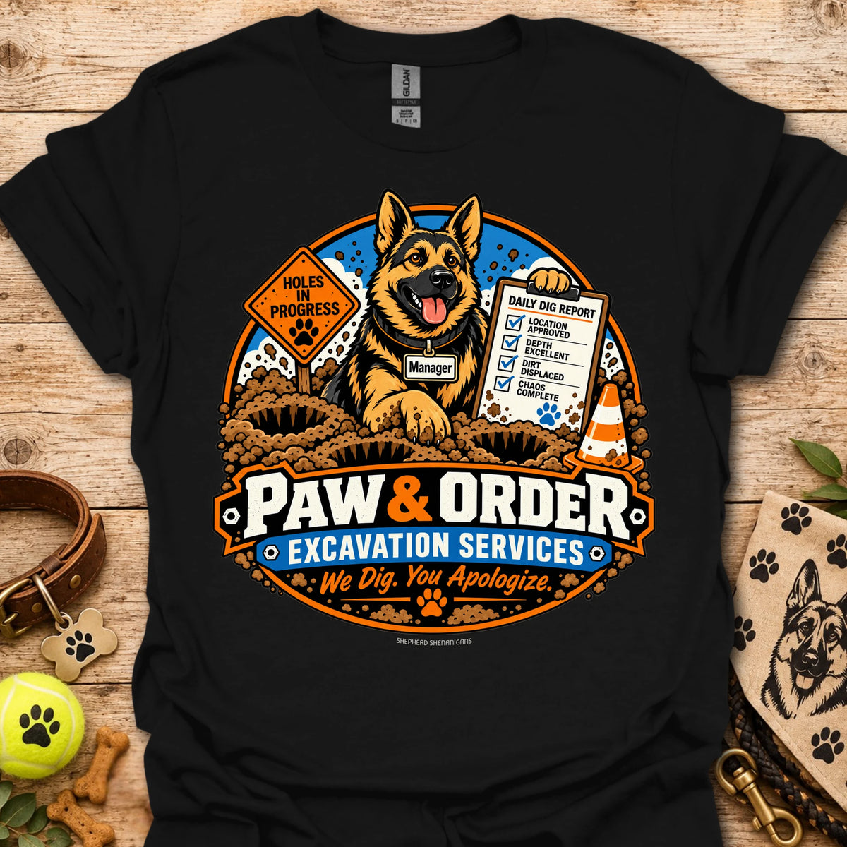 Black Paw & Order excavation T-shirt with dog digging emblem and “We Dig You Apologize” text