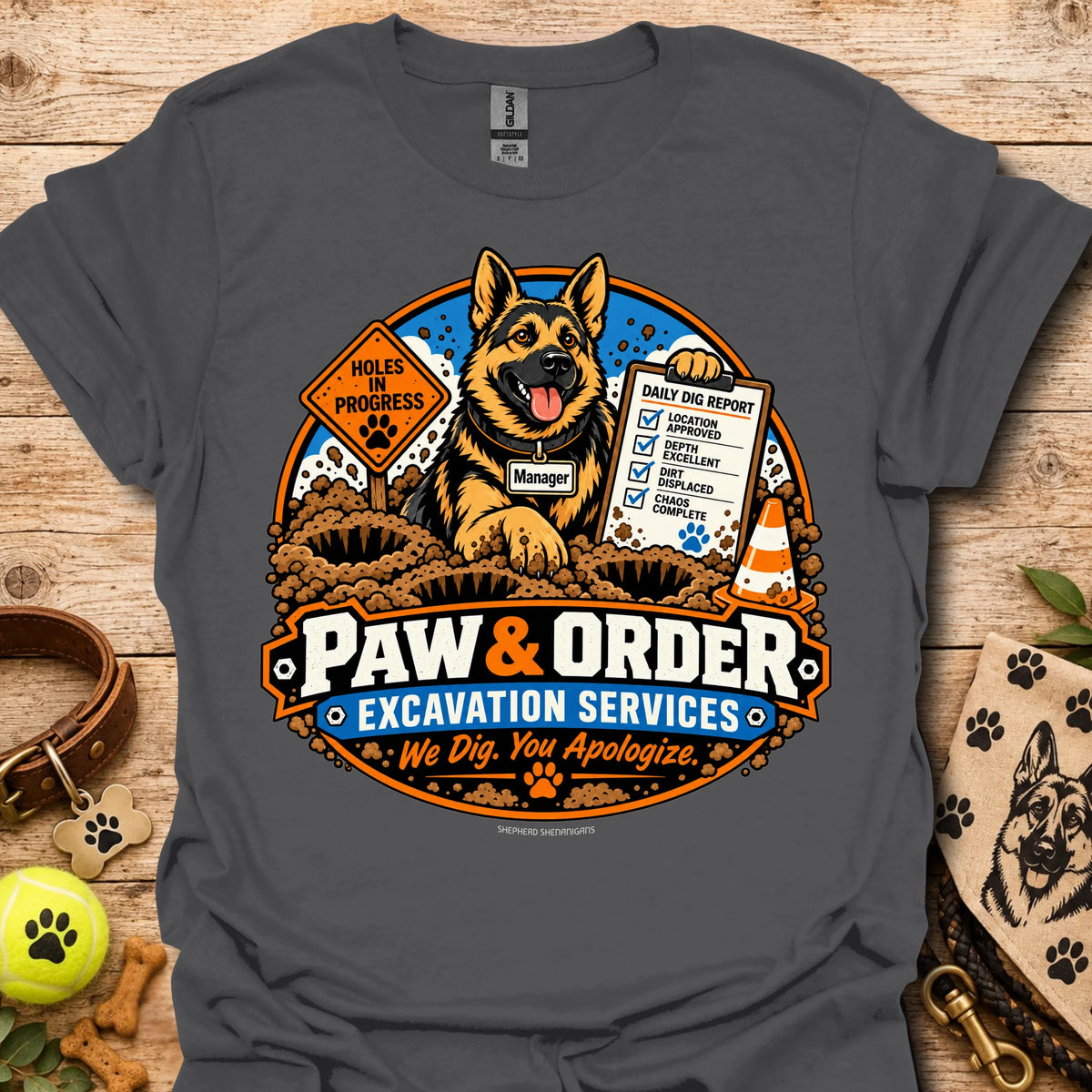 Charcoal grey Paw & Order excavation T-shirt with dog digging emblem and “We Dig You Apologize” text