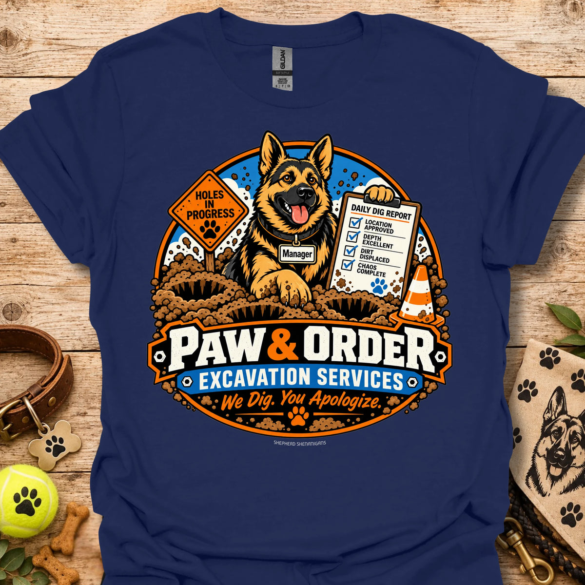 Blue Paw & Order excavation T-shirt with dog digging emblem and “We Dig You Apologize” text