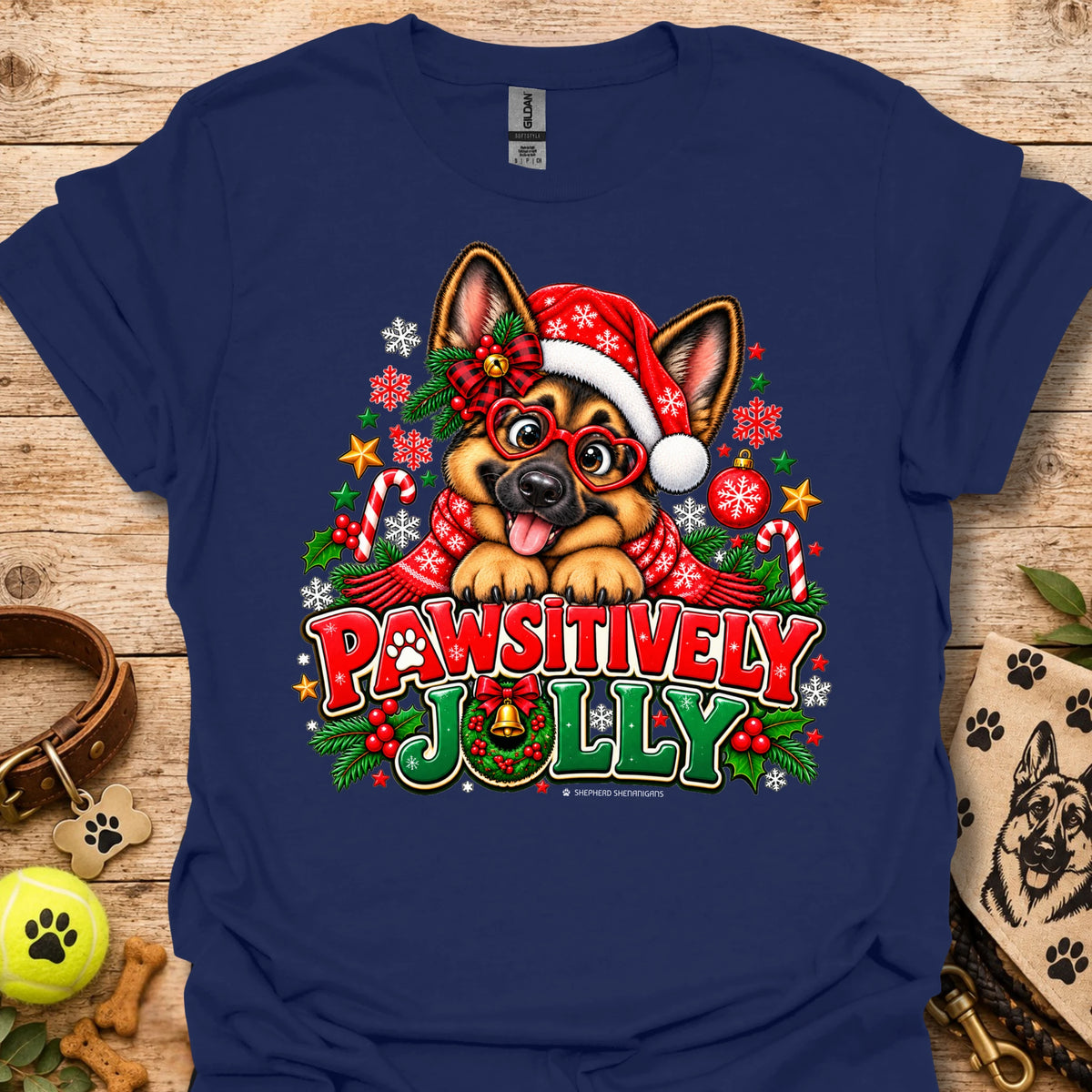 Navy T-shirt with festive dog in Santa hat graphic and "Pawsitively Jolly" text