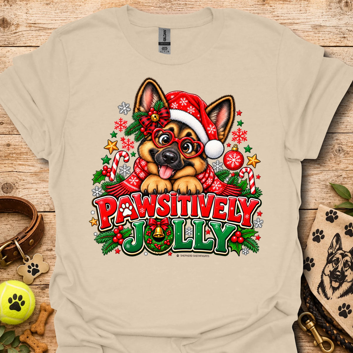 Sand T-shirt with festive dog in Santa hat graphic and "Pawsitively Jolly" text