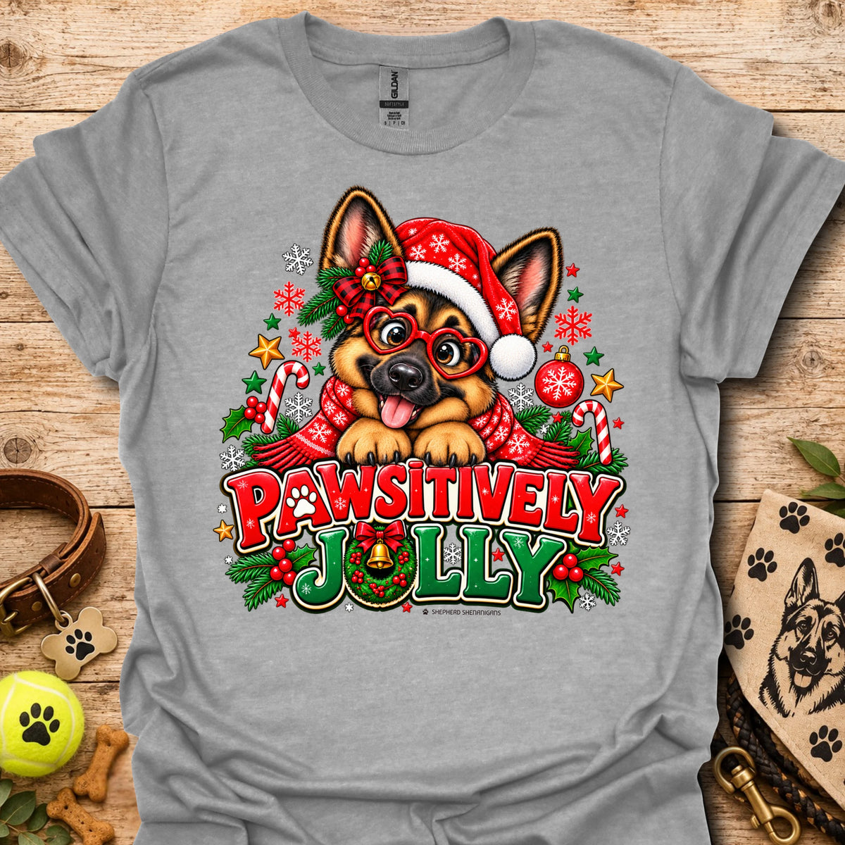 Heather grey T-shirt with festive dog in Santa hat graphic and "Pawsitively Jolly" text