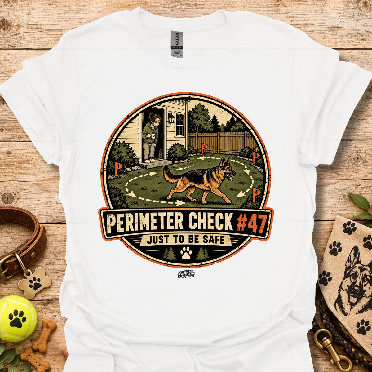 White T-shirt with circular perimeter check graphic showing a dog and “Just to be safe”