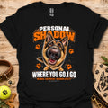 Black T-shirt with a German shepherd graphic, orange paw prints and bold slogan