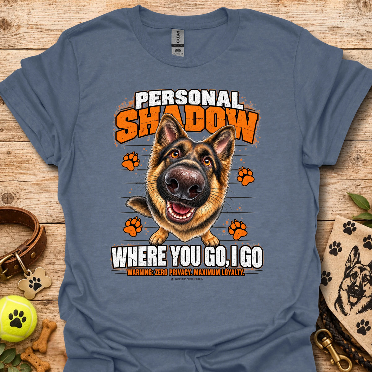 Heather indigo T-shirt with a German shepherd graphic, orange paw prints and bold slogan
