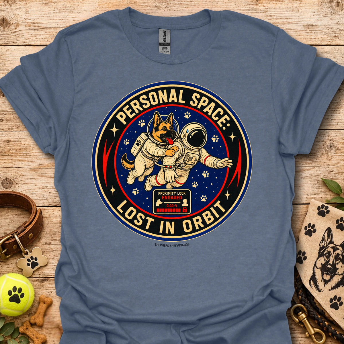 Charcoal gray t-shirt with astronaut dog graphic and circular 'Lost in Orbit' text