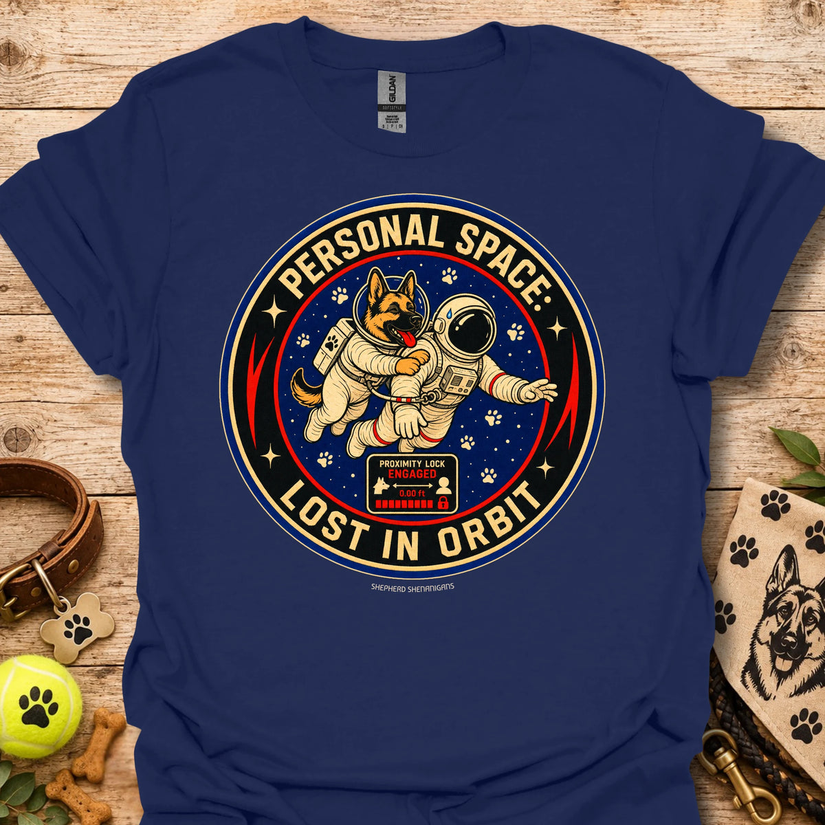 Navy t-shirt with astronaut dog graphic and circular 'Lost in Orbit' text