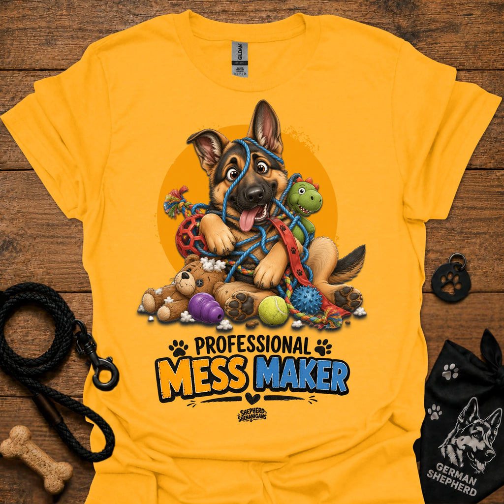 Gold T-shirt with cartoon German shepherd and colorful mess-maker graphic