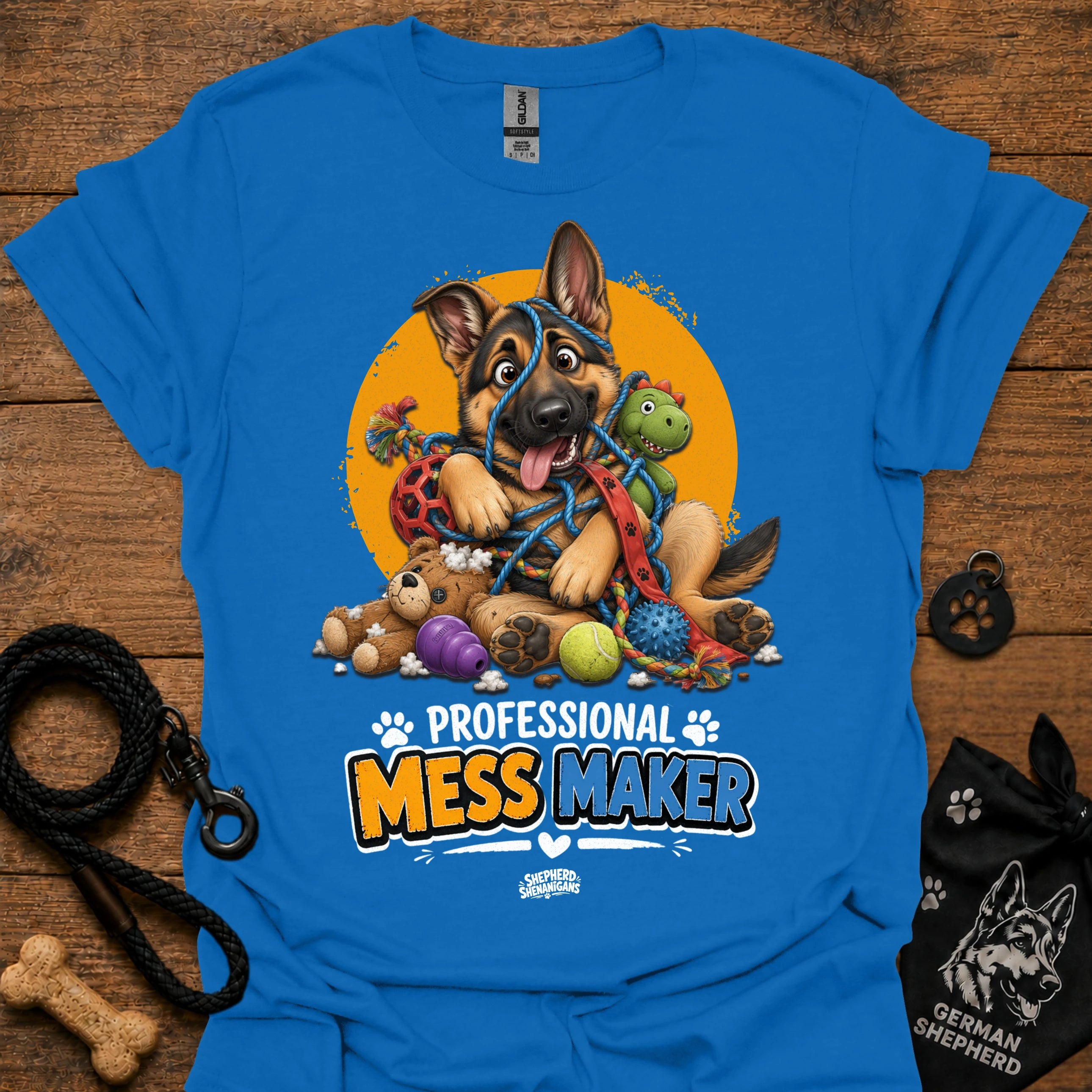 Royal blue T-shirt with cartoon German shepherd and colorful mess-maker graphic