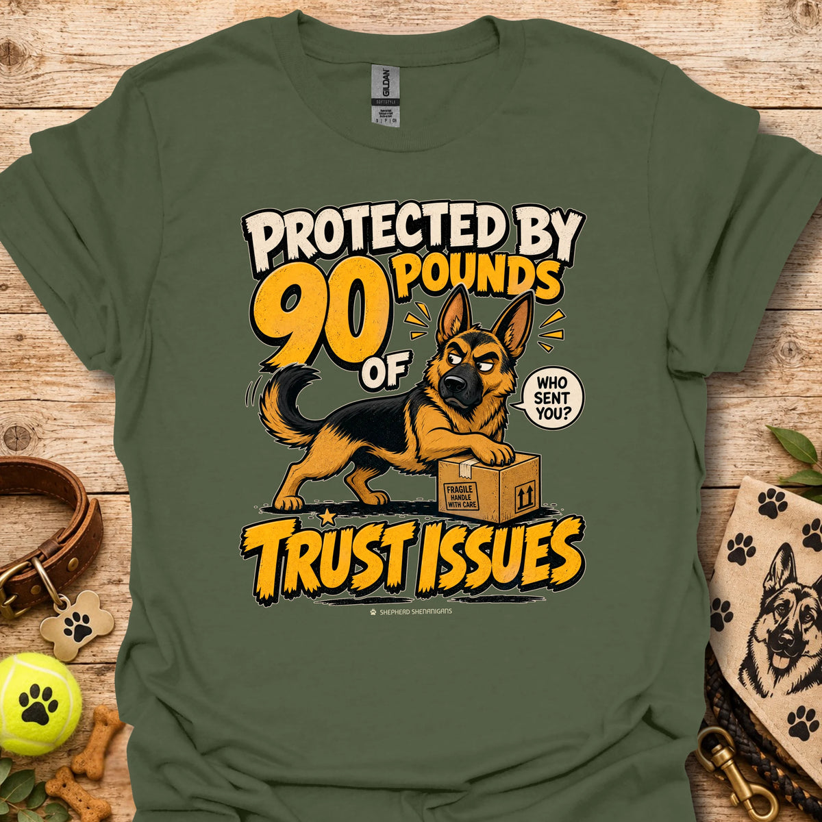 Military green T-shirt with a German shepherd graphic and “Protected by 90 Pounds of Trust Issues” text