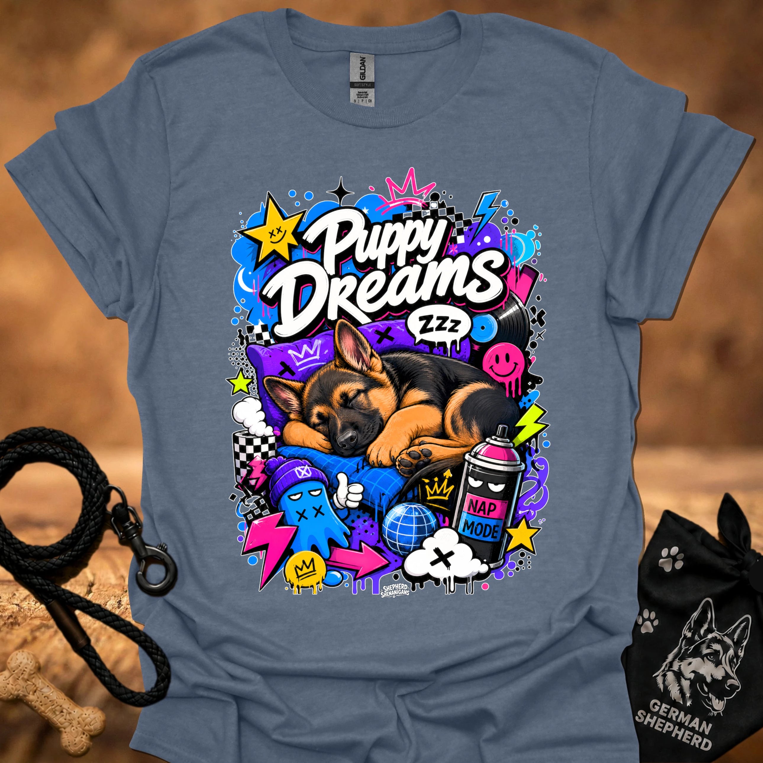 Blue-gray T-shirt with colorful Puppy Dreams graphic of a sleeping puppy and icons.