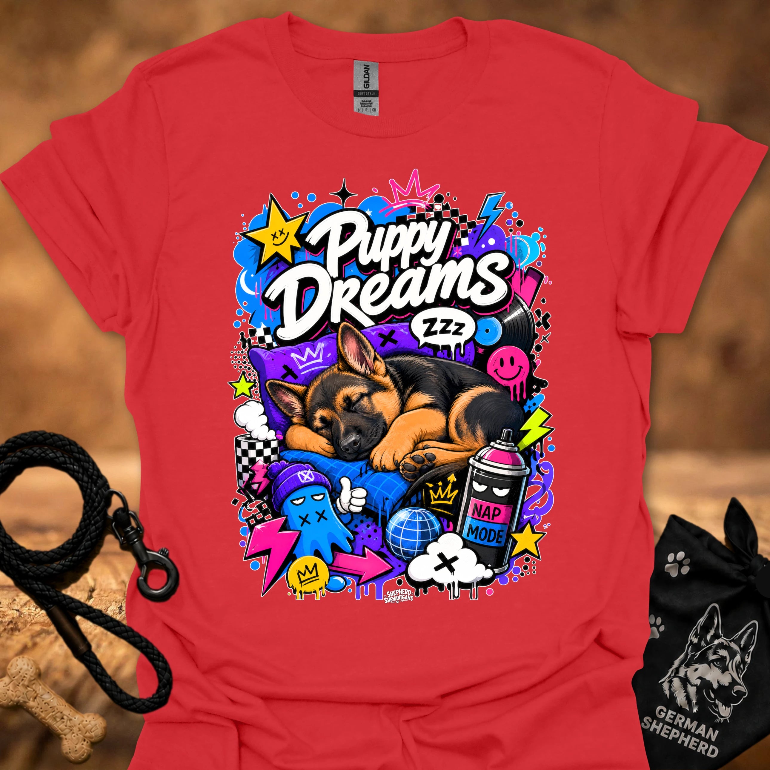 Red T-shirt with colorful Puppy Dreams graphic of a sleeping puppy and playful icons.