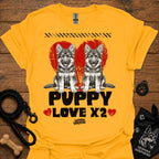 Gold kids dog T-shirt with two gray puppies, red hearts, and 'PUPPY LOVE X2' print.