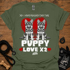 Military green kids dog T-shirt with two gray puppies, red hearts, and 'PUPPY LOVE X2' print.