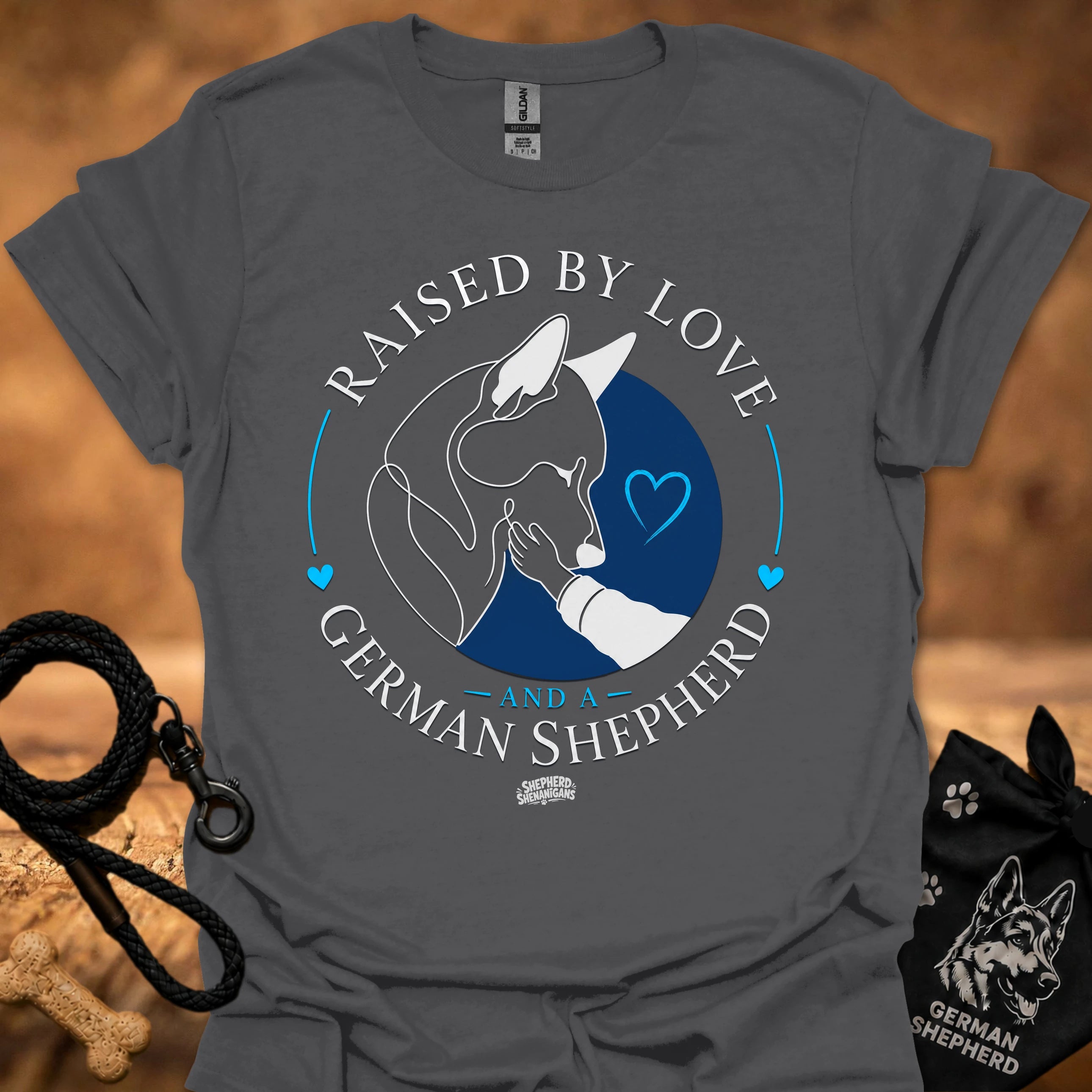 Charcoal T-shirt with Raised By Love German Shepherd graphic and blue heart circle