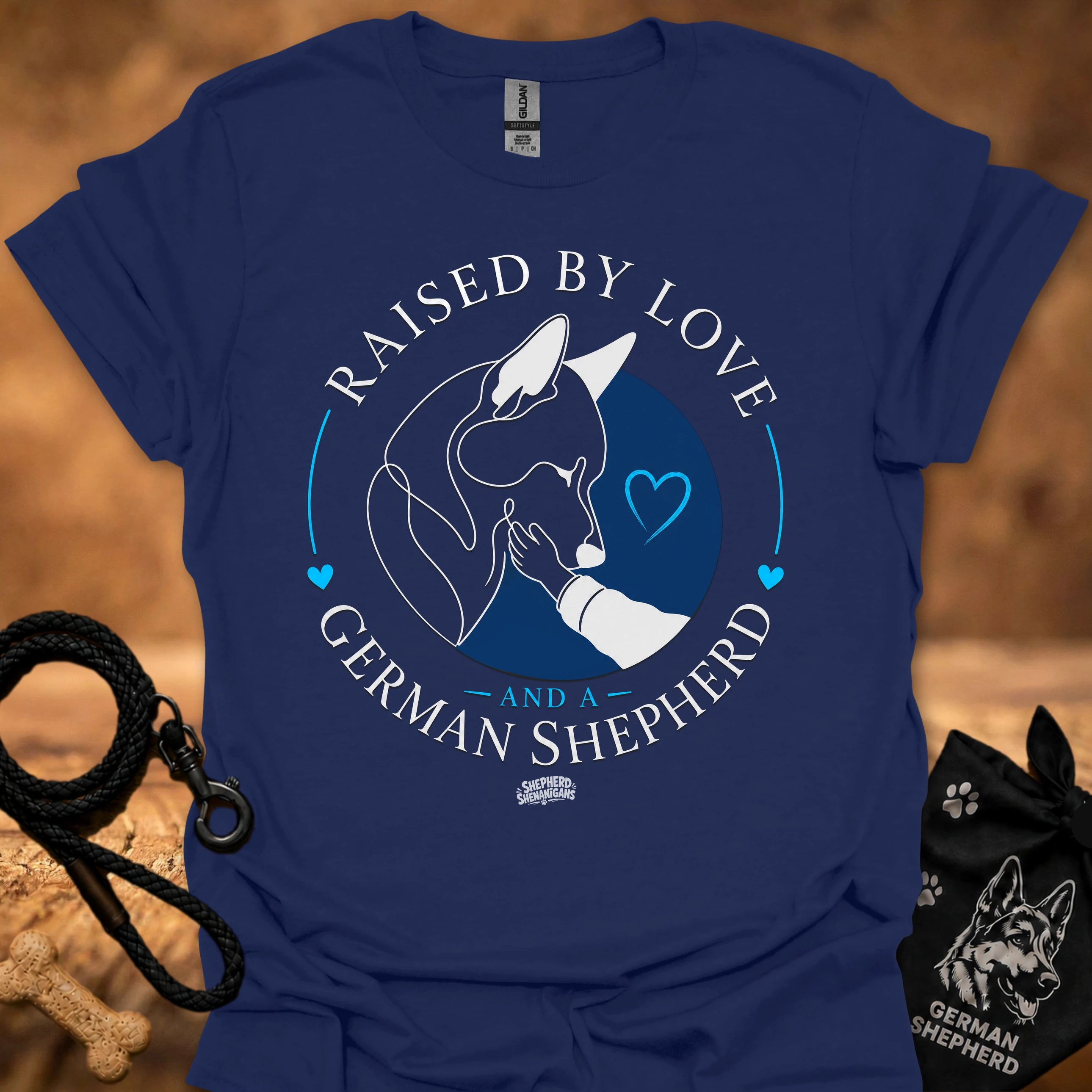 Navy T-shirt with Raised By Love German Shepherd graphic and blue heart circle