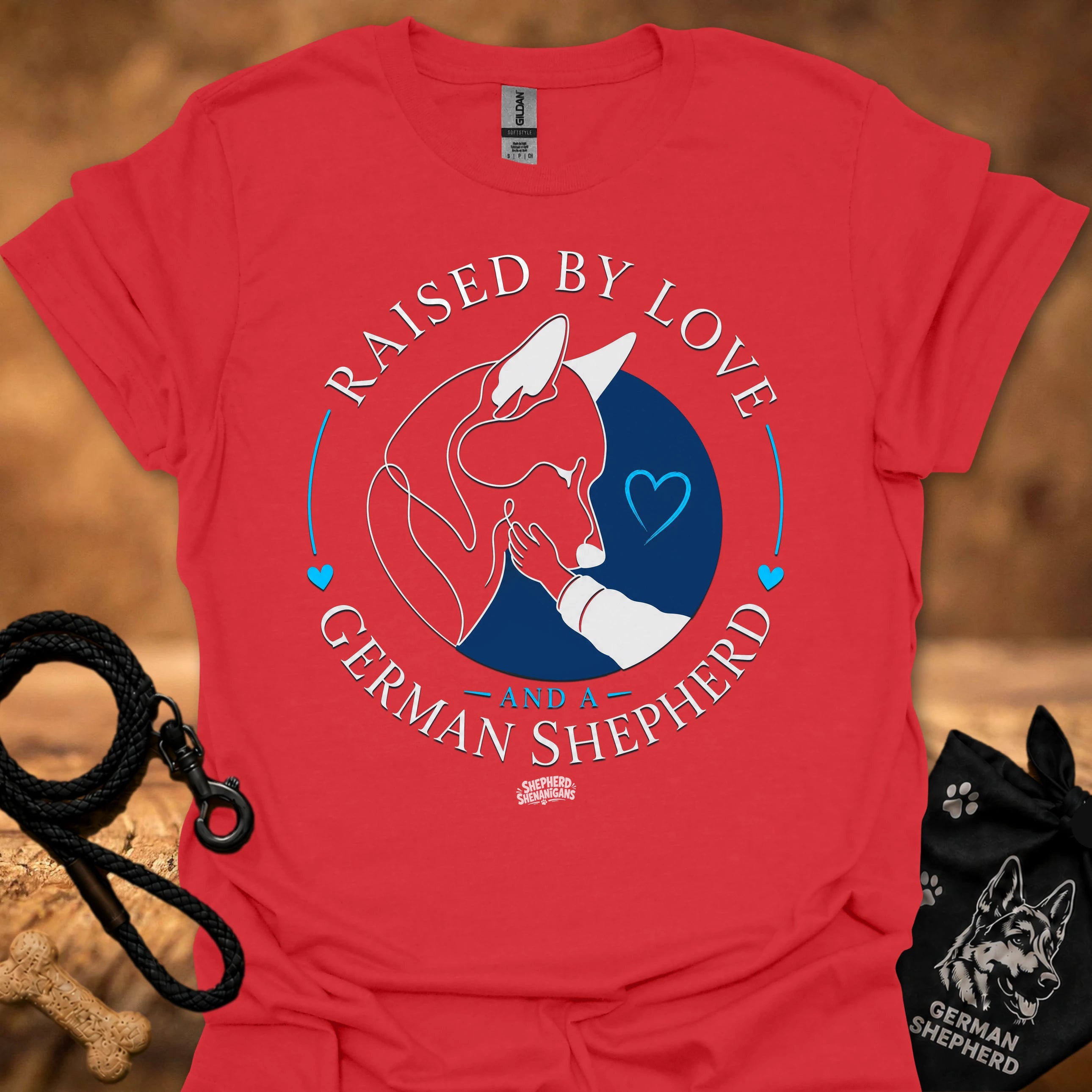 Red T-shirt with Raised By Love German Shepherd graphic and heart circle design