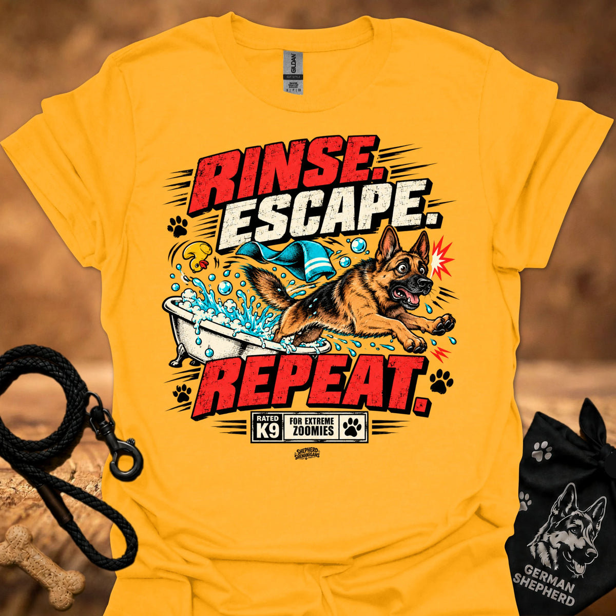 Gold short-sleeve T-shirt with colorful dog graphic and bold text on front