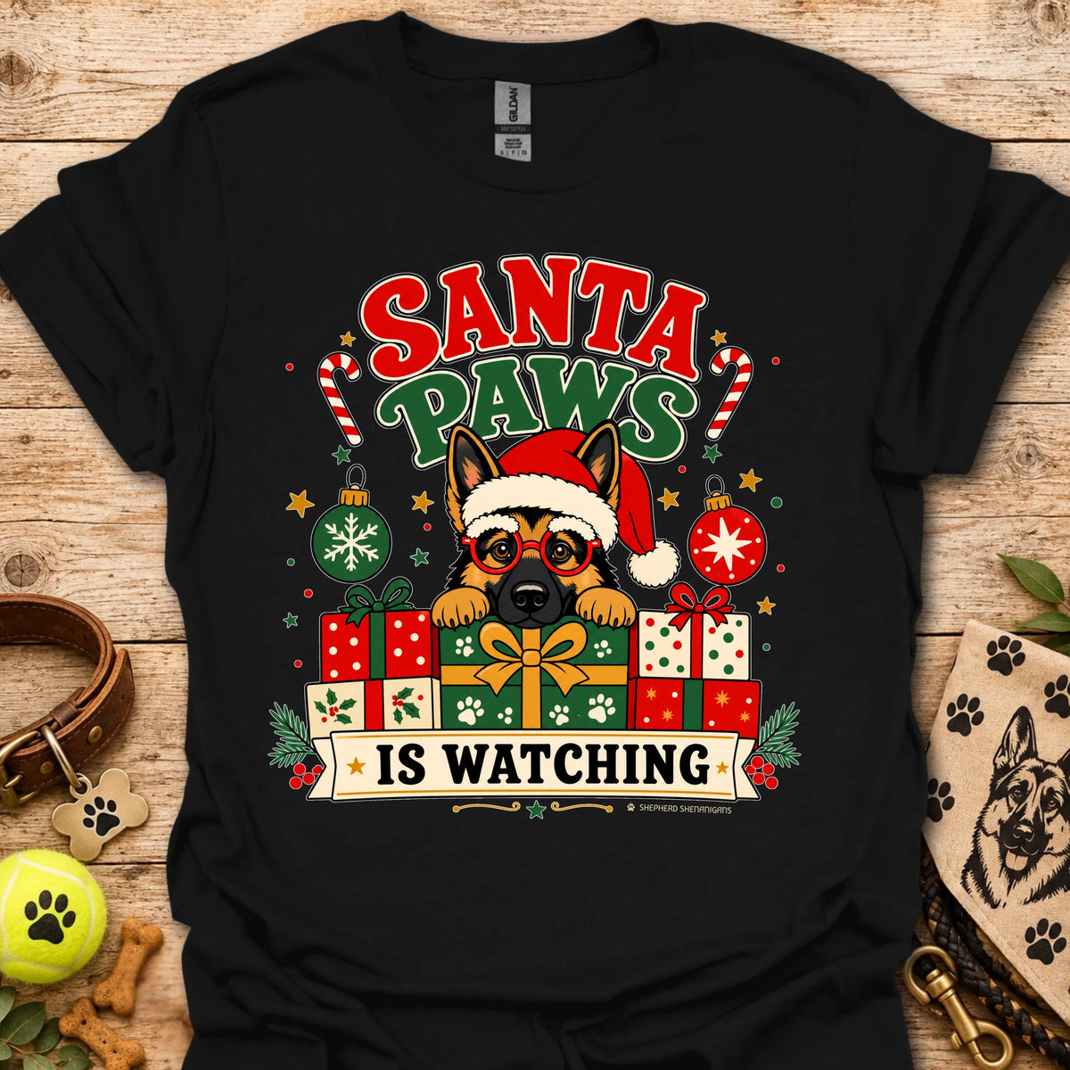 Black crew-neck t-shirt with cartoon dog Santa hat and gift graphic