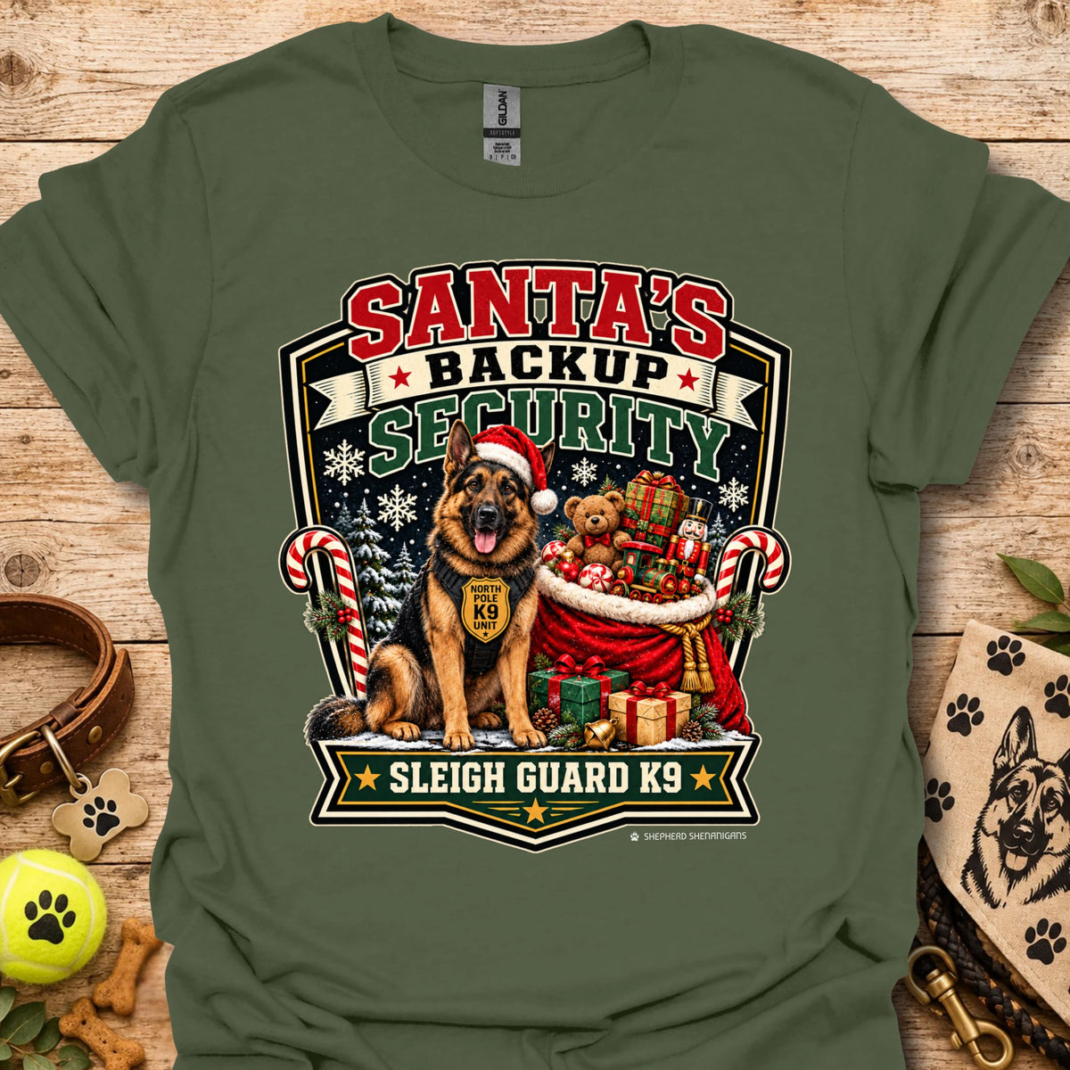 Military green T-shirt with Santa security K9 sleigh guard graphic