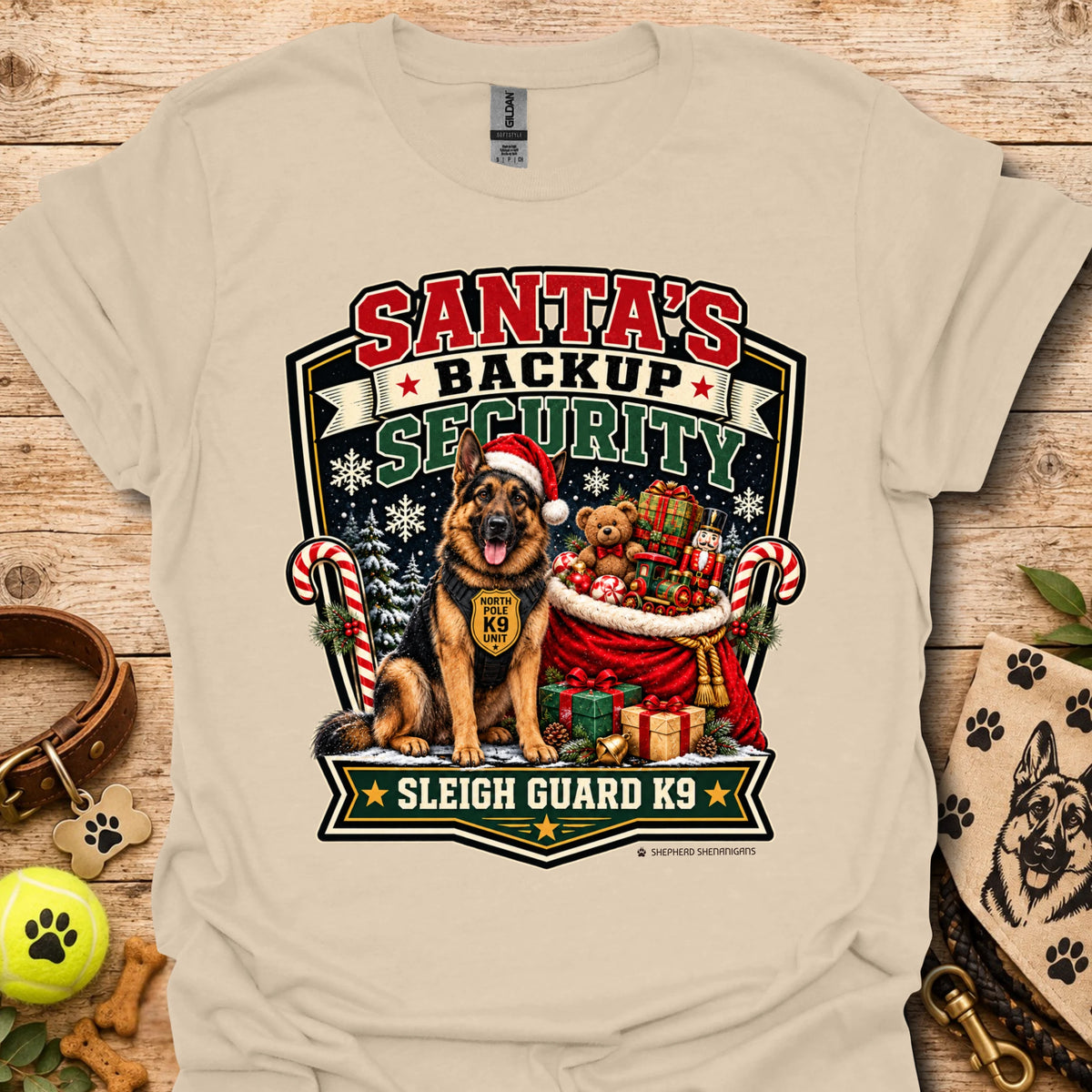 Sand T-shirt with Santa security K9 sleigh guard graphic