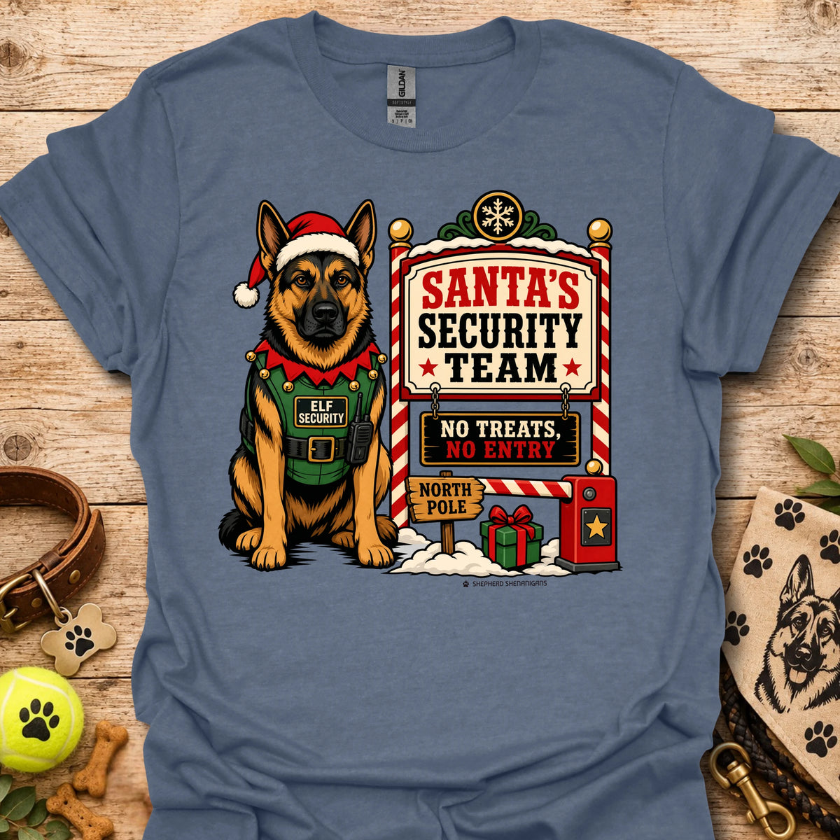Heather indigo T-shirt featuring elf dog character beside Santa's Security Team graphic