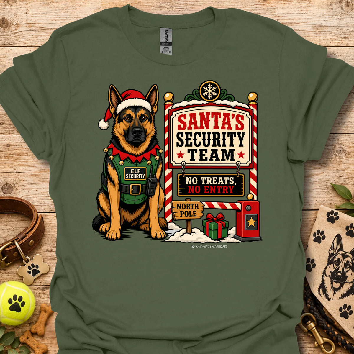 Military green T-shirt with elf dog standing beside Santa's Security Team design