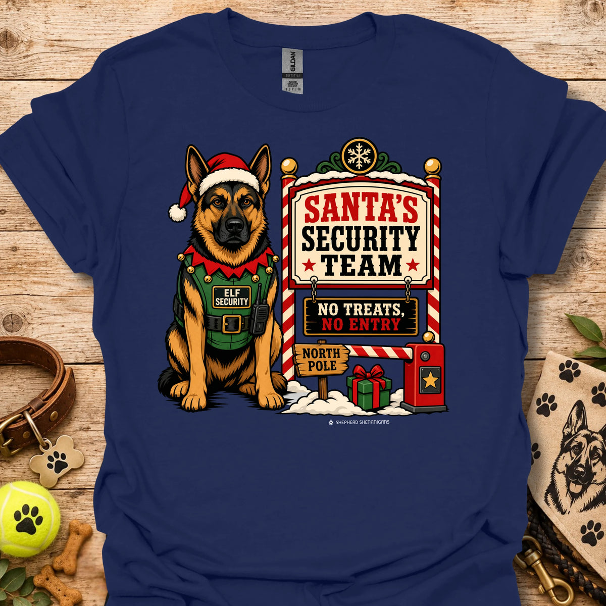 Navy T-shirt with dog elf character next to Santa's Security Team graphic