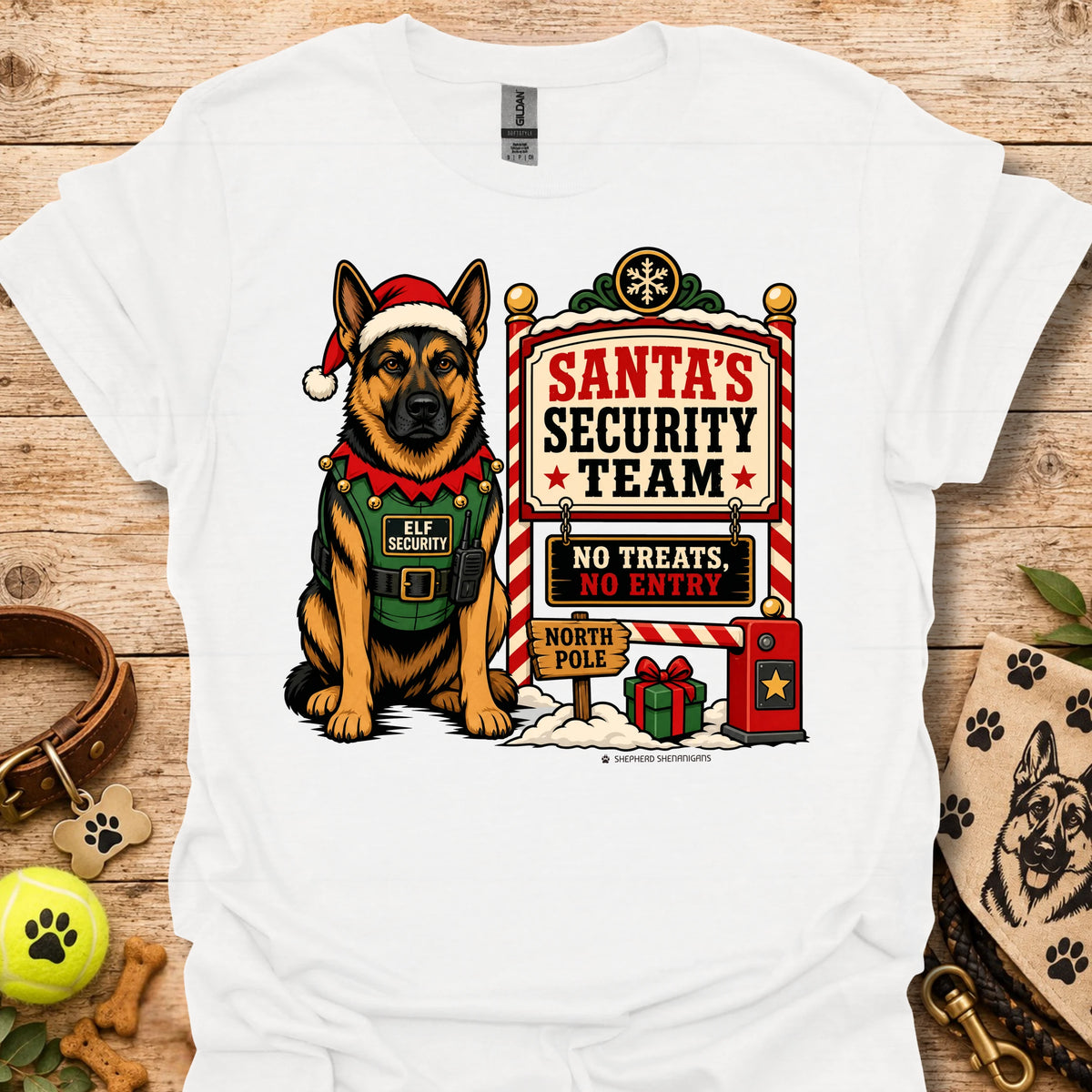 White T-shirt with elf dog illustration beside Santa's Security Team poster graphic