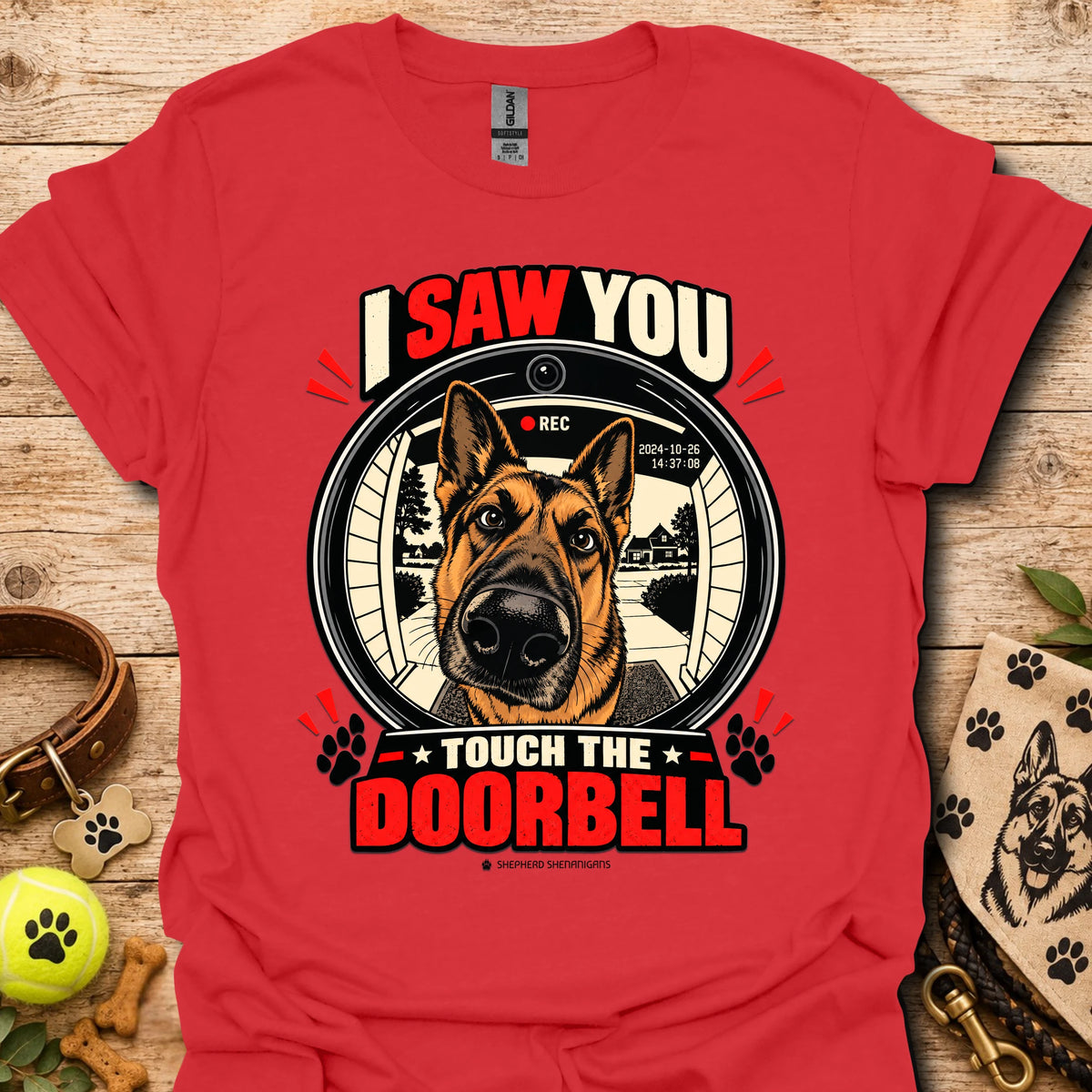 Red dog doorbell graphic T-shirt with circular “Touch the Doorbell” text and paw icons