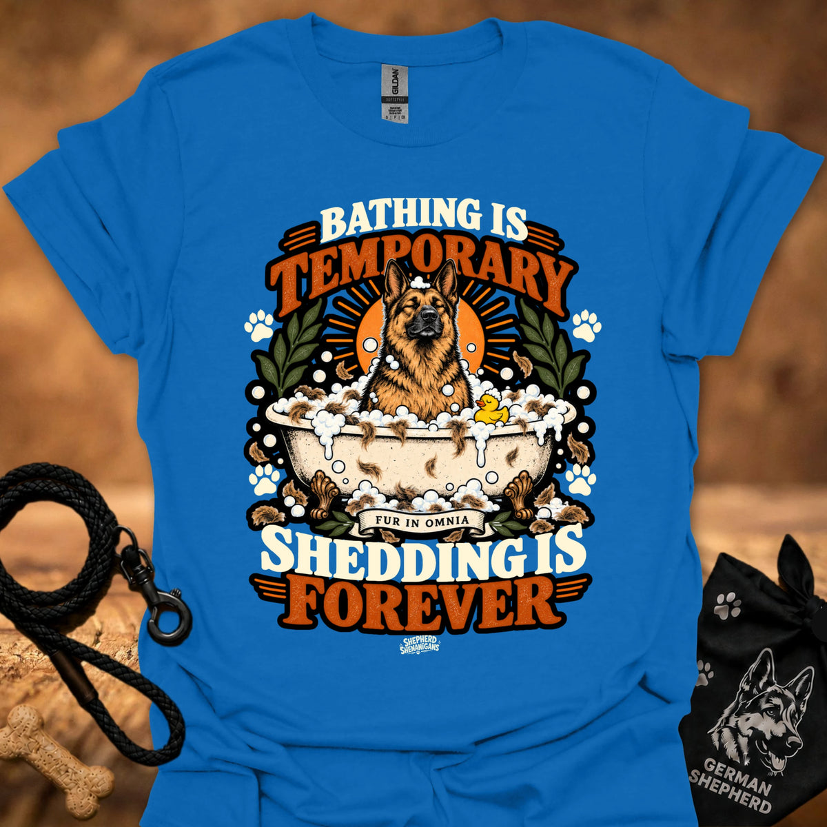 Royal blue T-shirt with orange dog graphic and 'Shedding is Forever' text