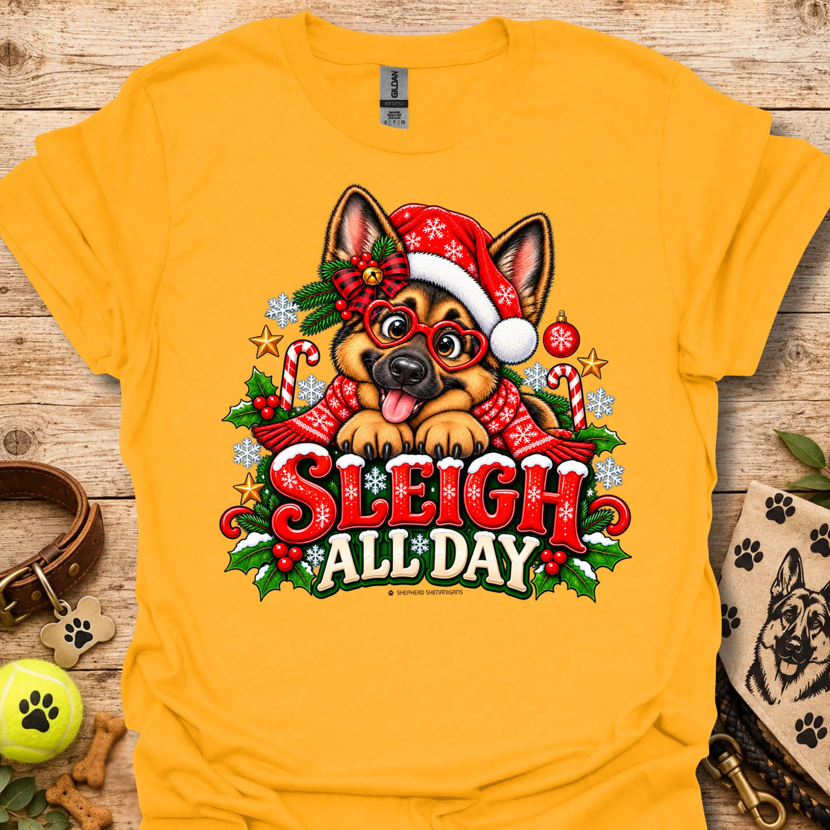Gold t-shirt with 'Sleigh All Day' holiday cartoon dog graphic