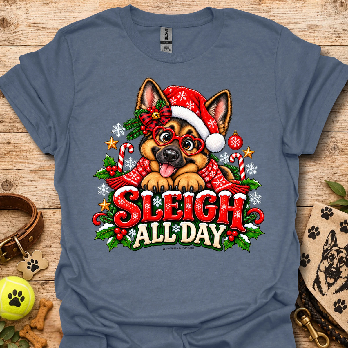 Heather blue t-shirt with 'Sleigh All Day' holiday cartoon dog graphic