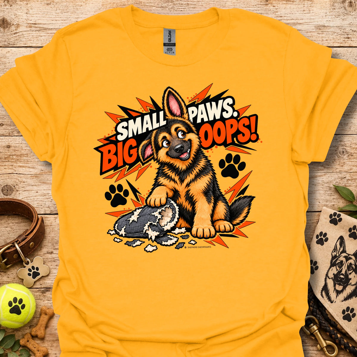 Mustard yellow graphic T-shirt with cartoon dog and paw print burst