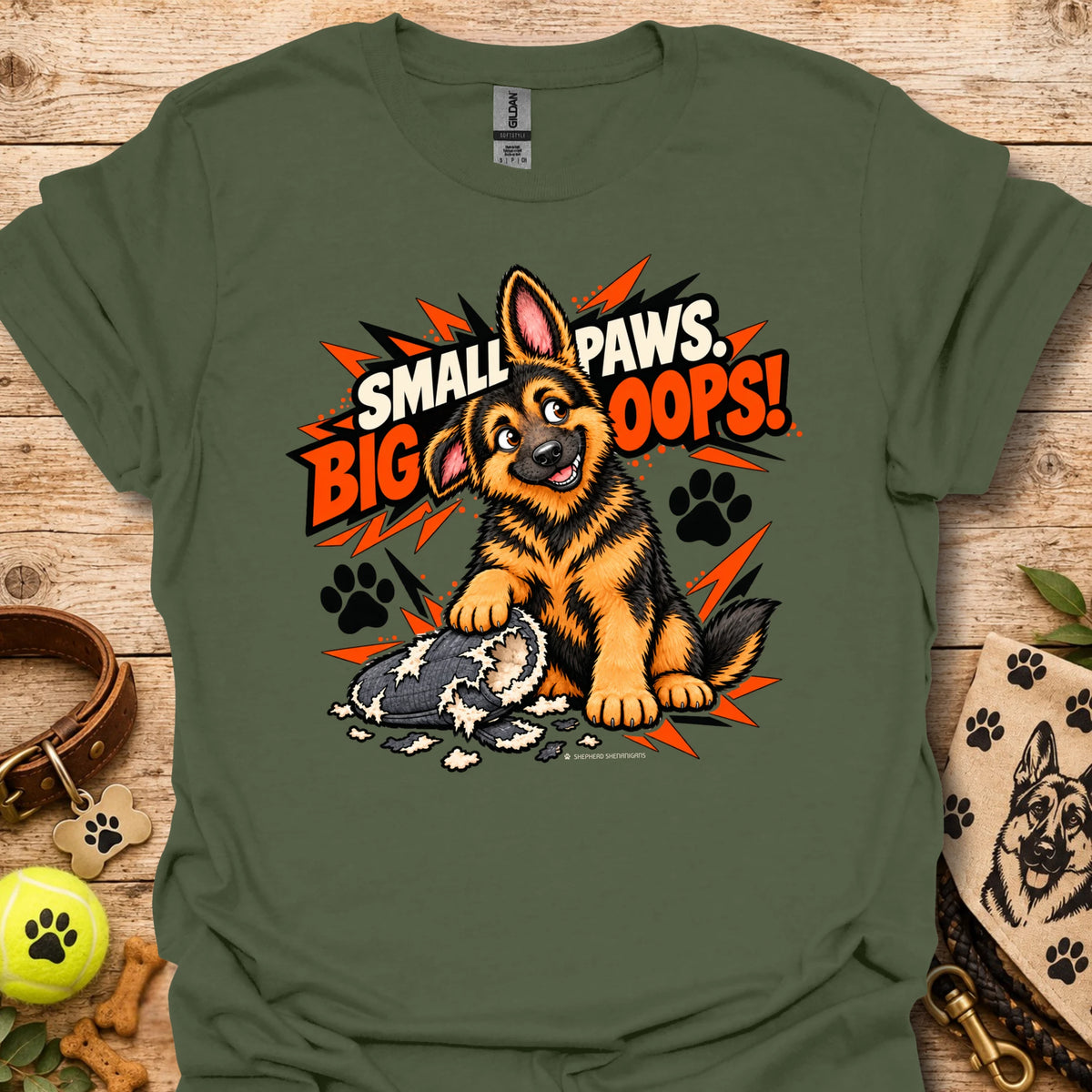 Dark green graphic T-shirt with cartoon dog and paw print burst