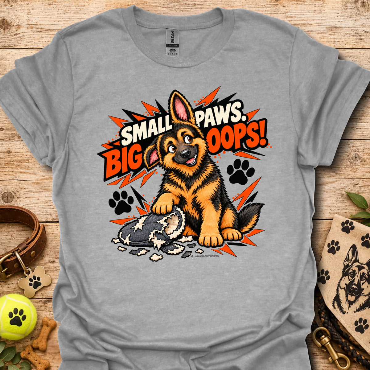 Heather gray graphic T-shirt with cartoon dog and paw print burst