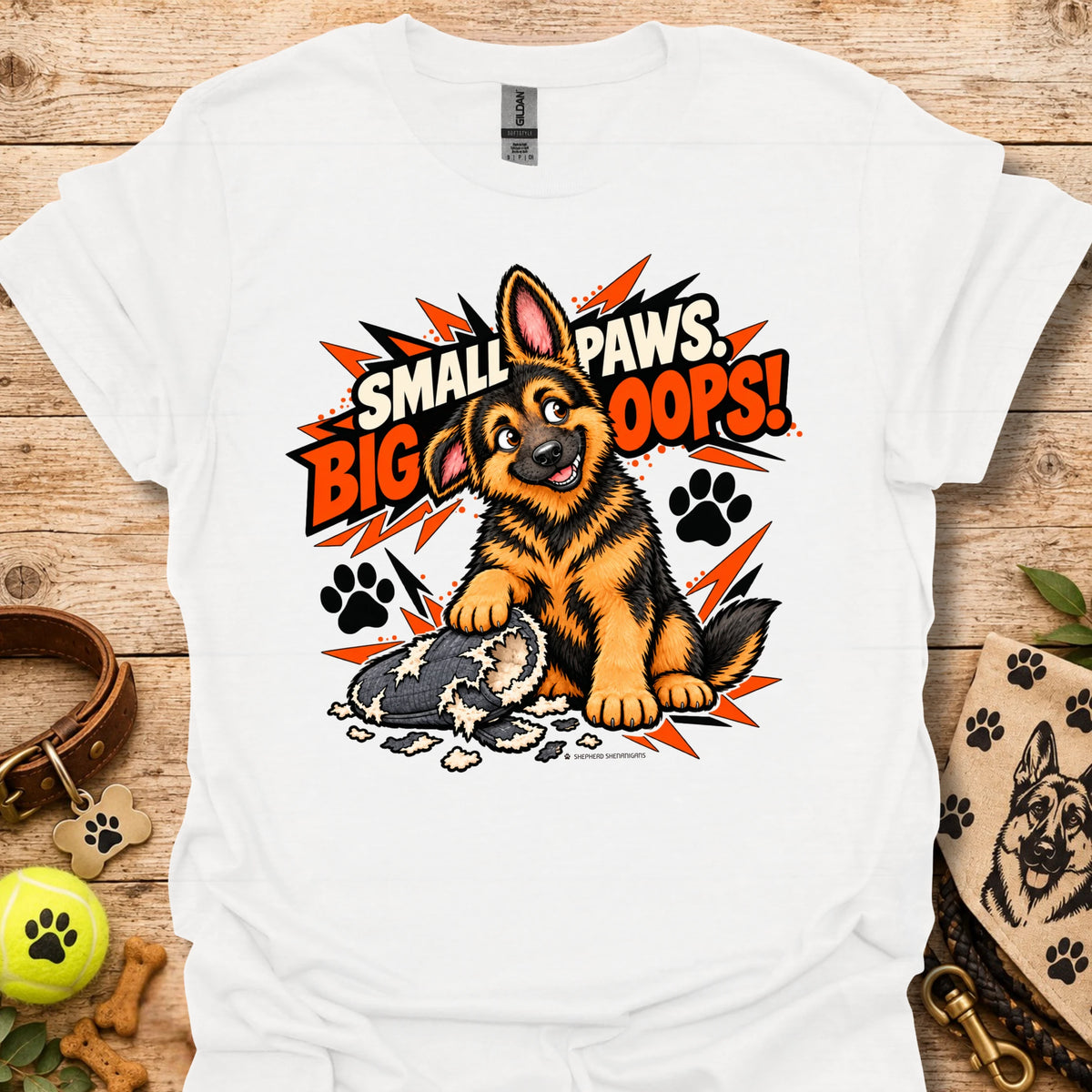 White graphic T-shirt with cartoon dog and paw print burst