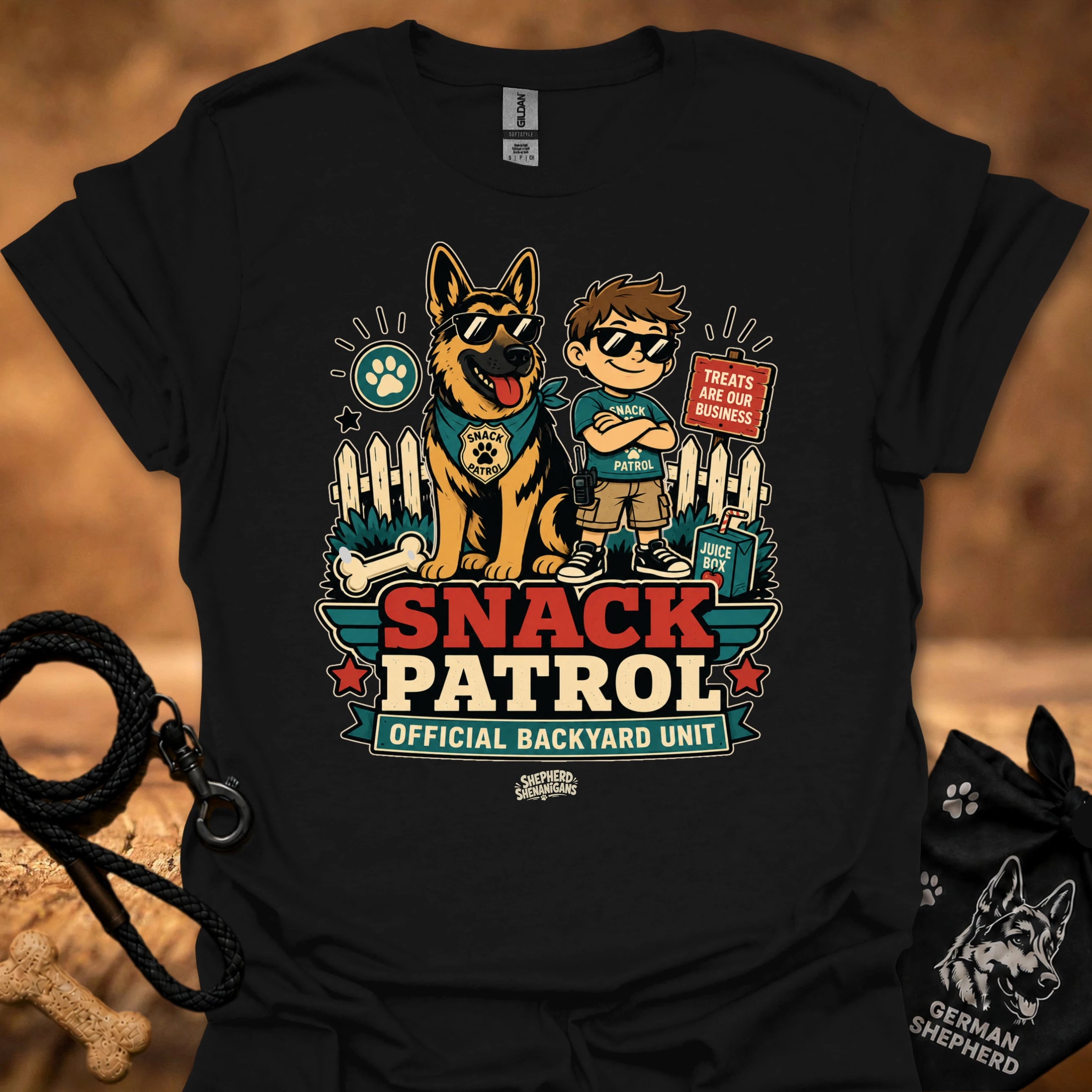 Black graphic T-shirt with dog and boy print, Snack Patrol front text, crew neck.