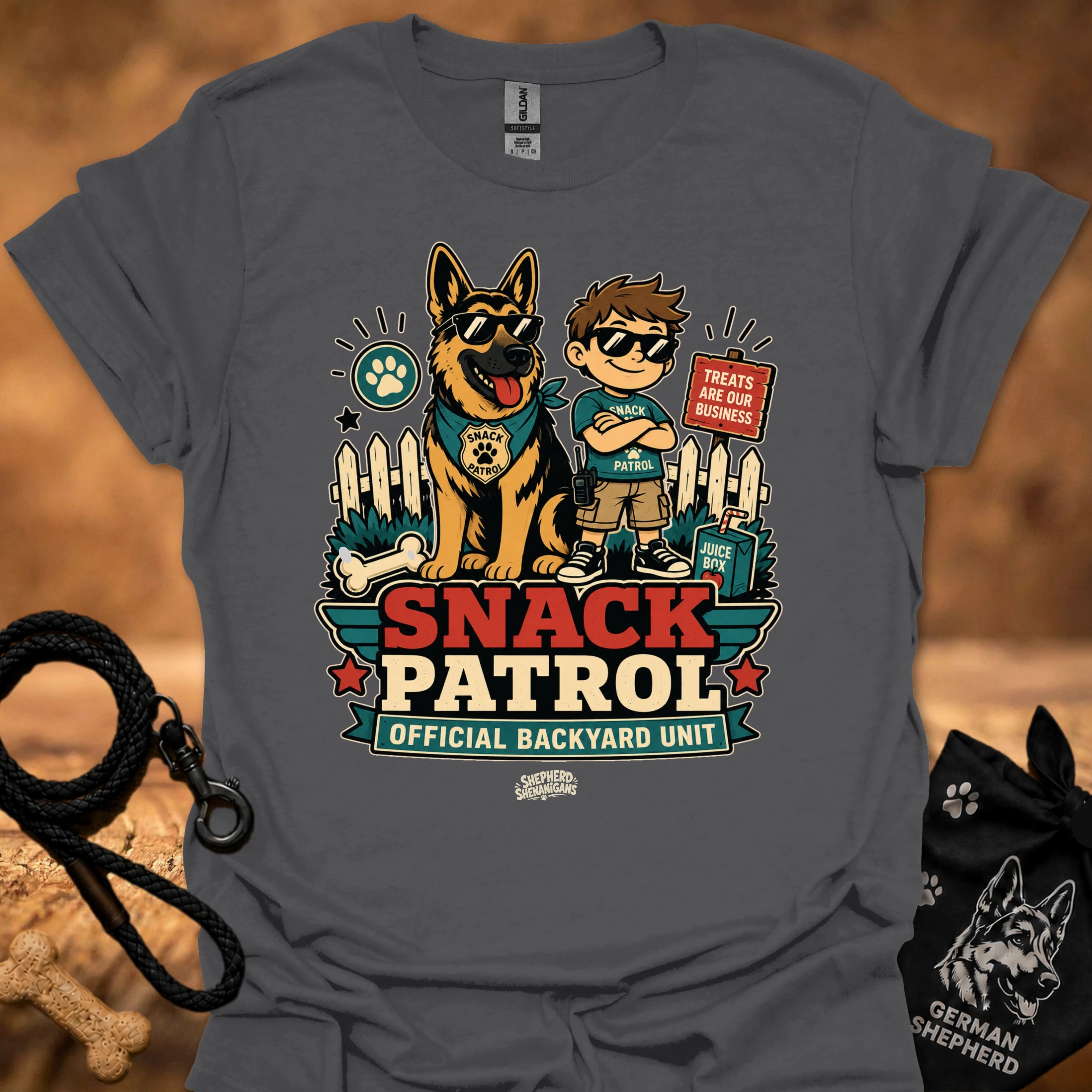 Charcoal graphic T-shirt with dog and boy print, Snack Patrol front text, crew neck.