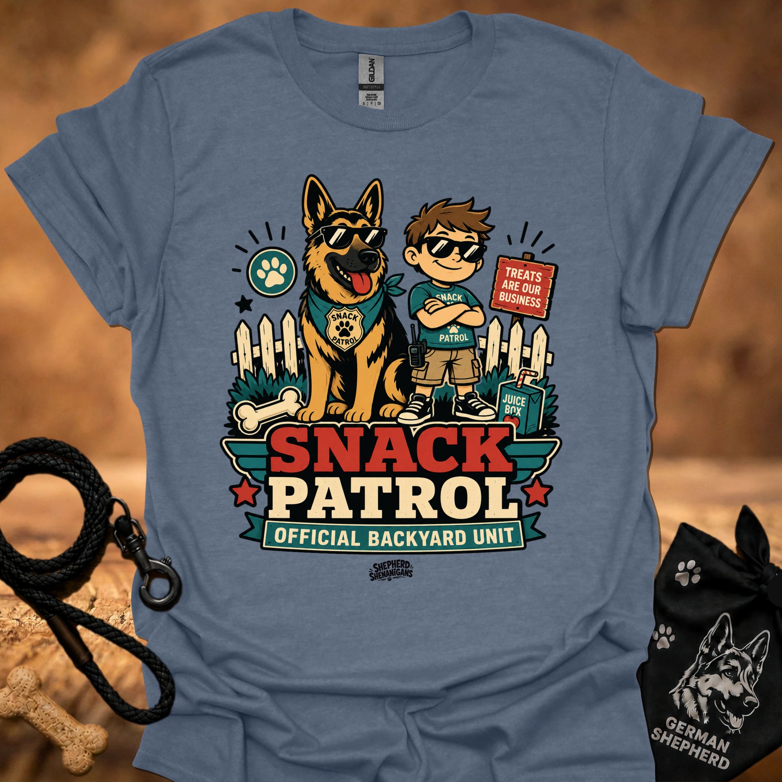 Heathered blue graphic T-shirt with dog and boy print, Snack Patrol front text, crew neck.