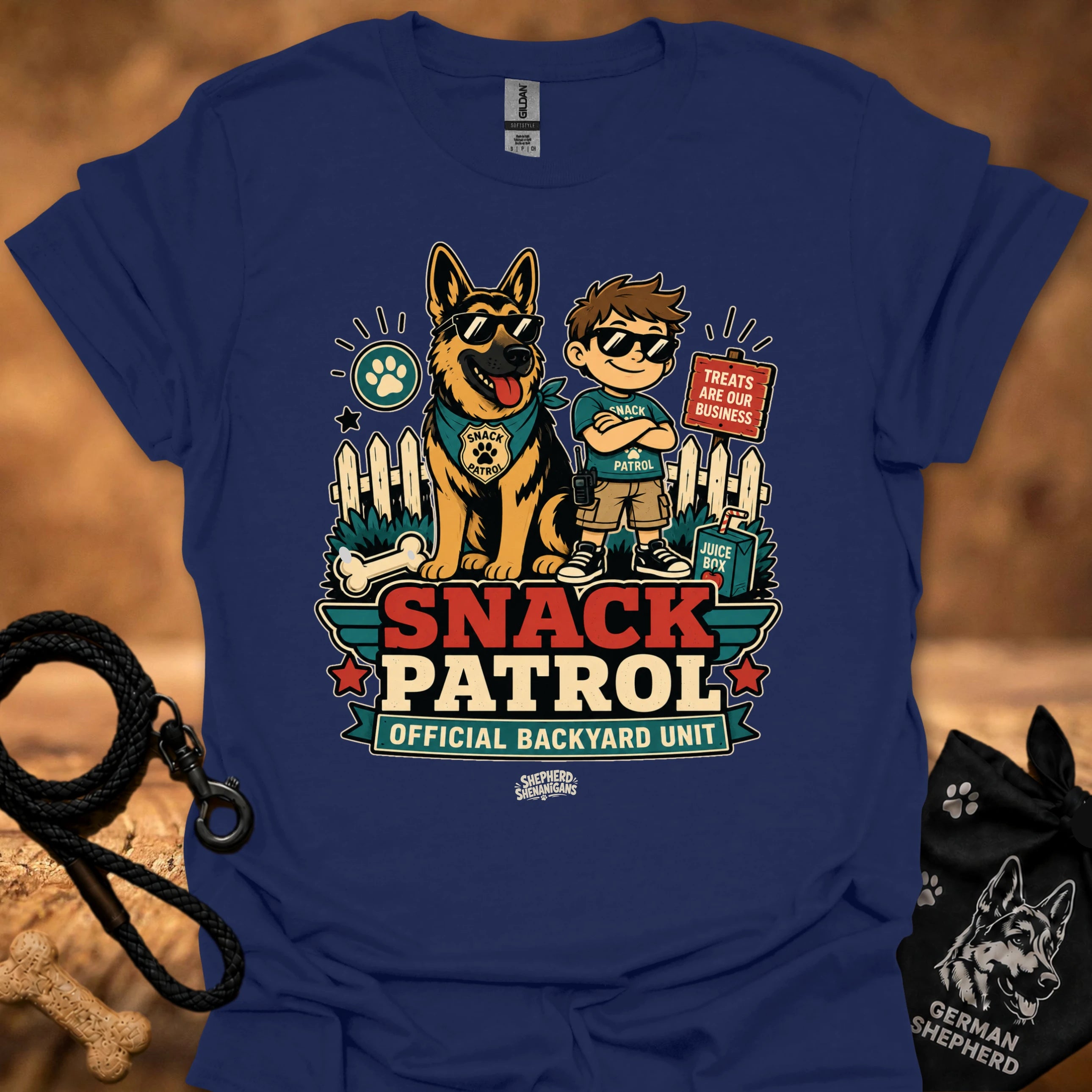 Navy graphic T-shirt with dog and boy print, Snack Patrol front text, crew neck.