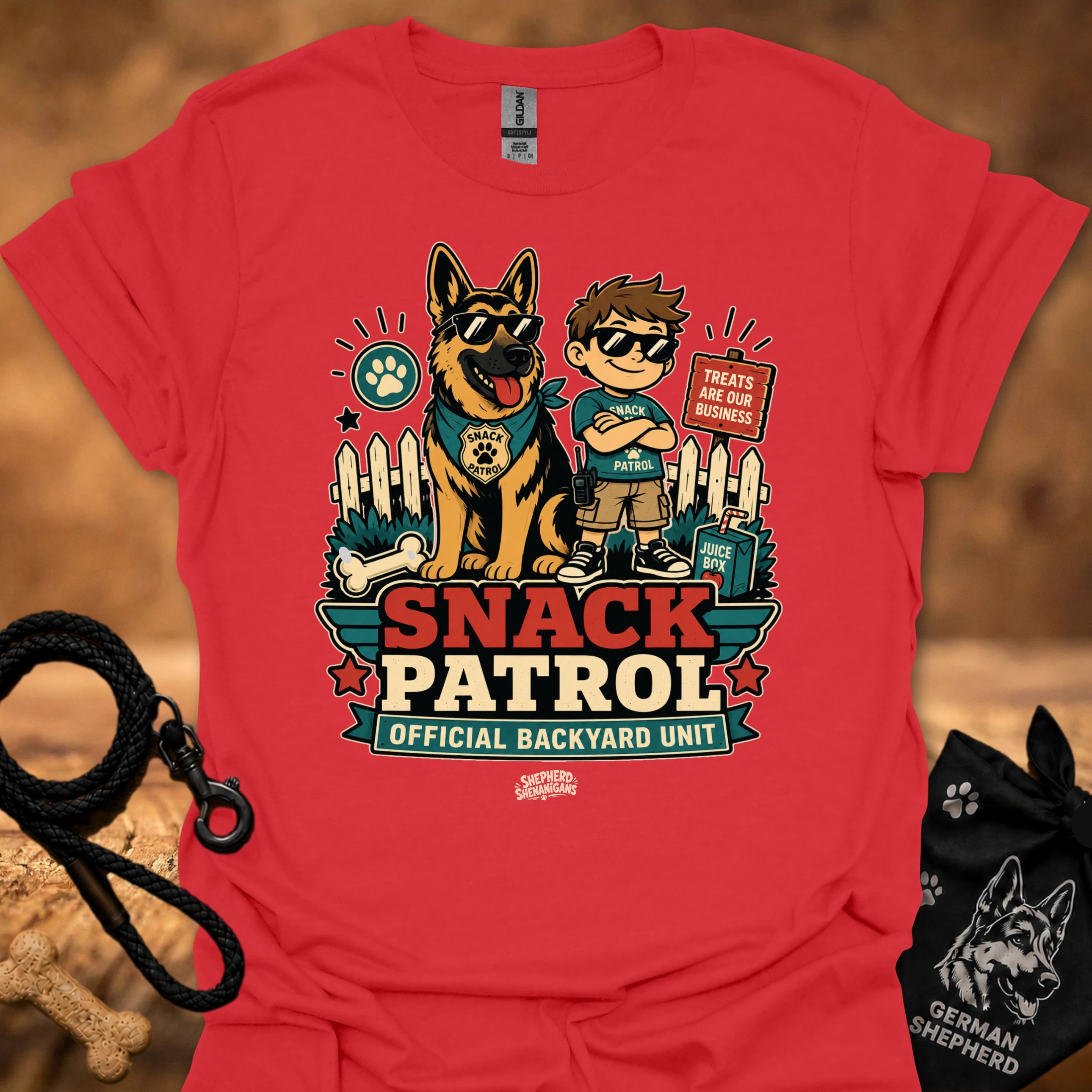 Red graphic T-shirt with dog and boy print, Snack Patrol front text, crew neck.