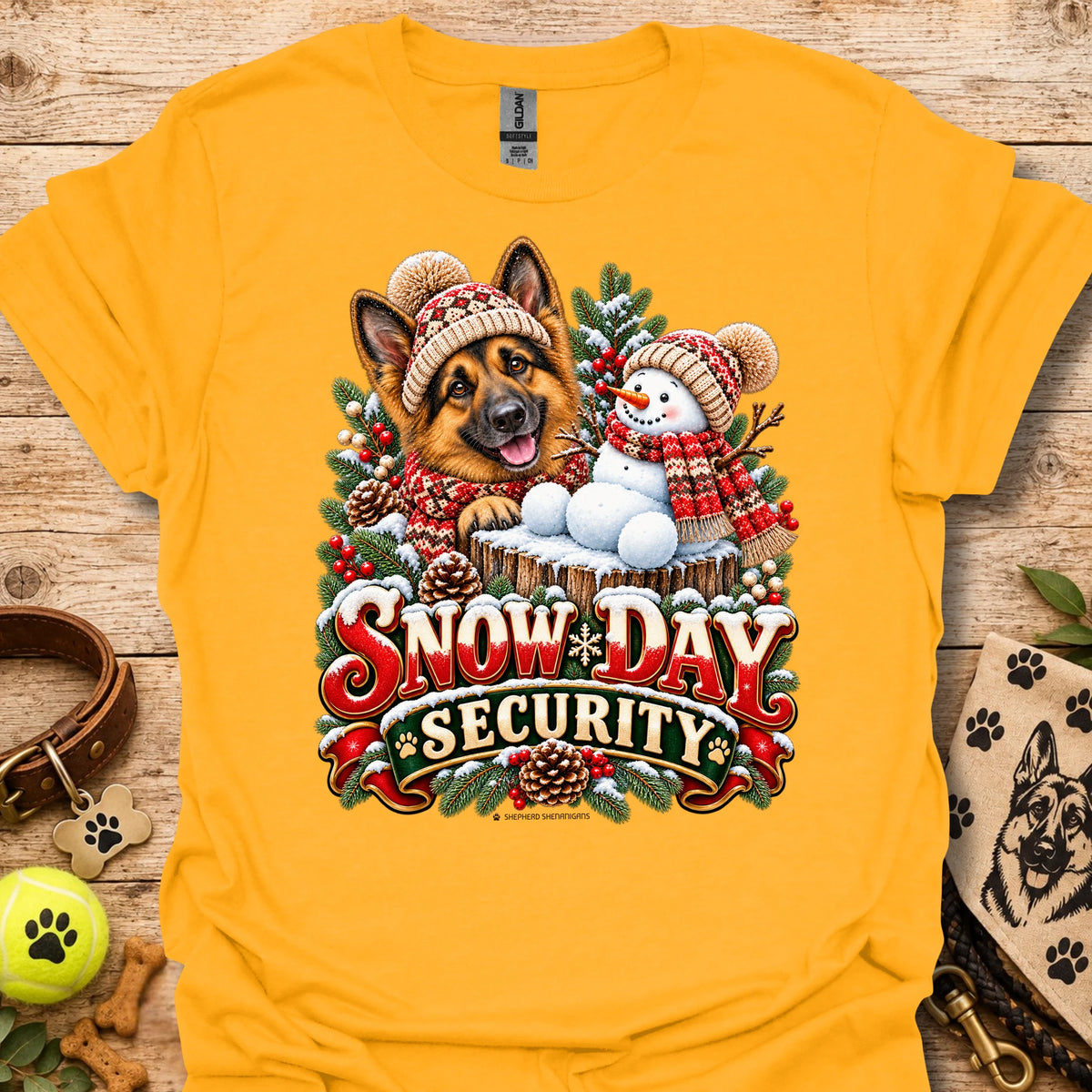 Gold crew-neck T-shirt with winter dog and snowman graphic