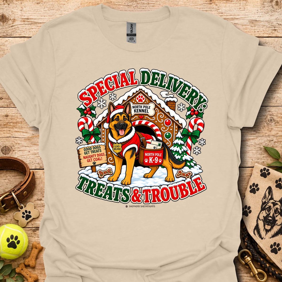 Dog holiday graphic T-shirt with Santa-style badge, sand beige