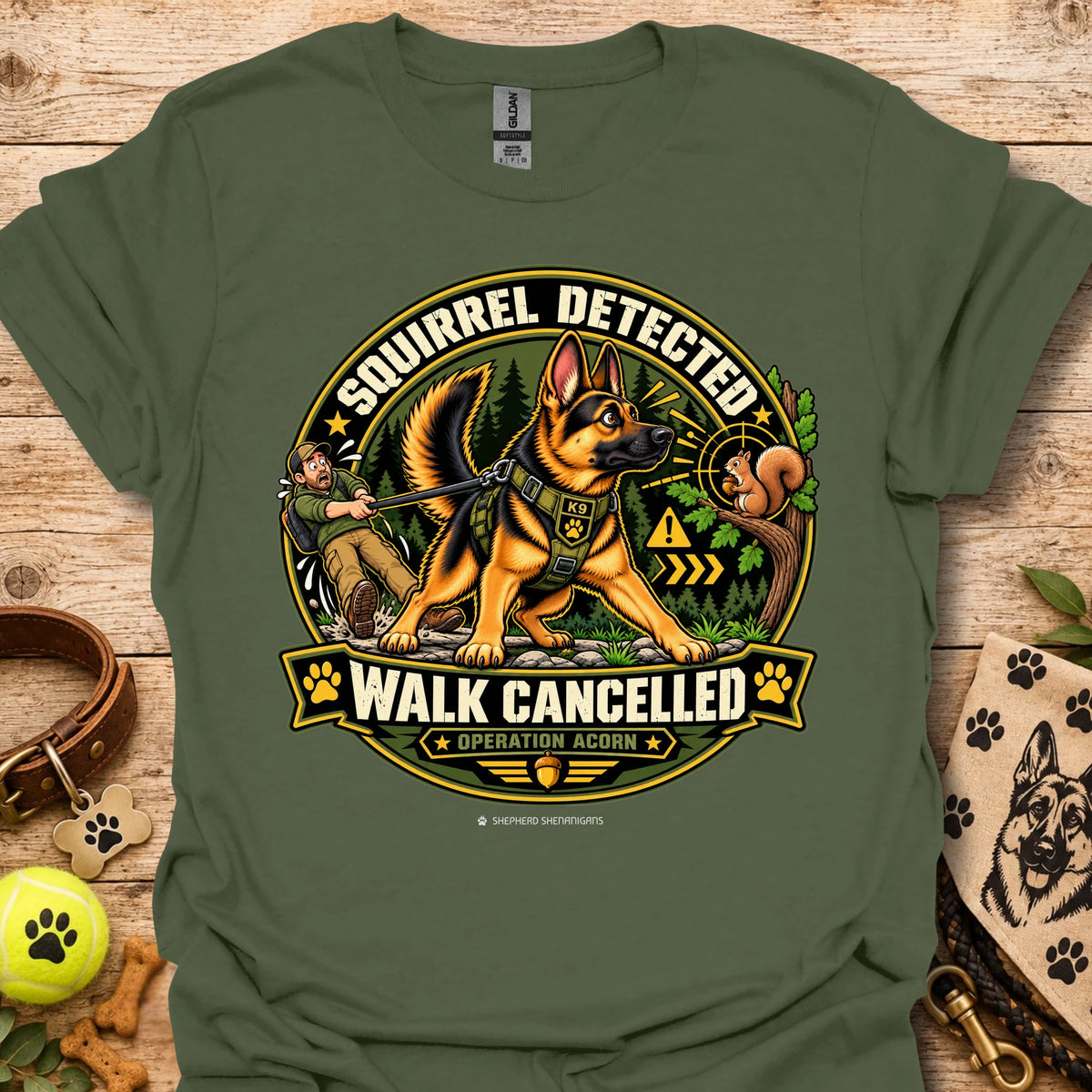Military green crew-neck t-shirt with squirrel “Walk Cancelled” emblem graphic