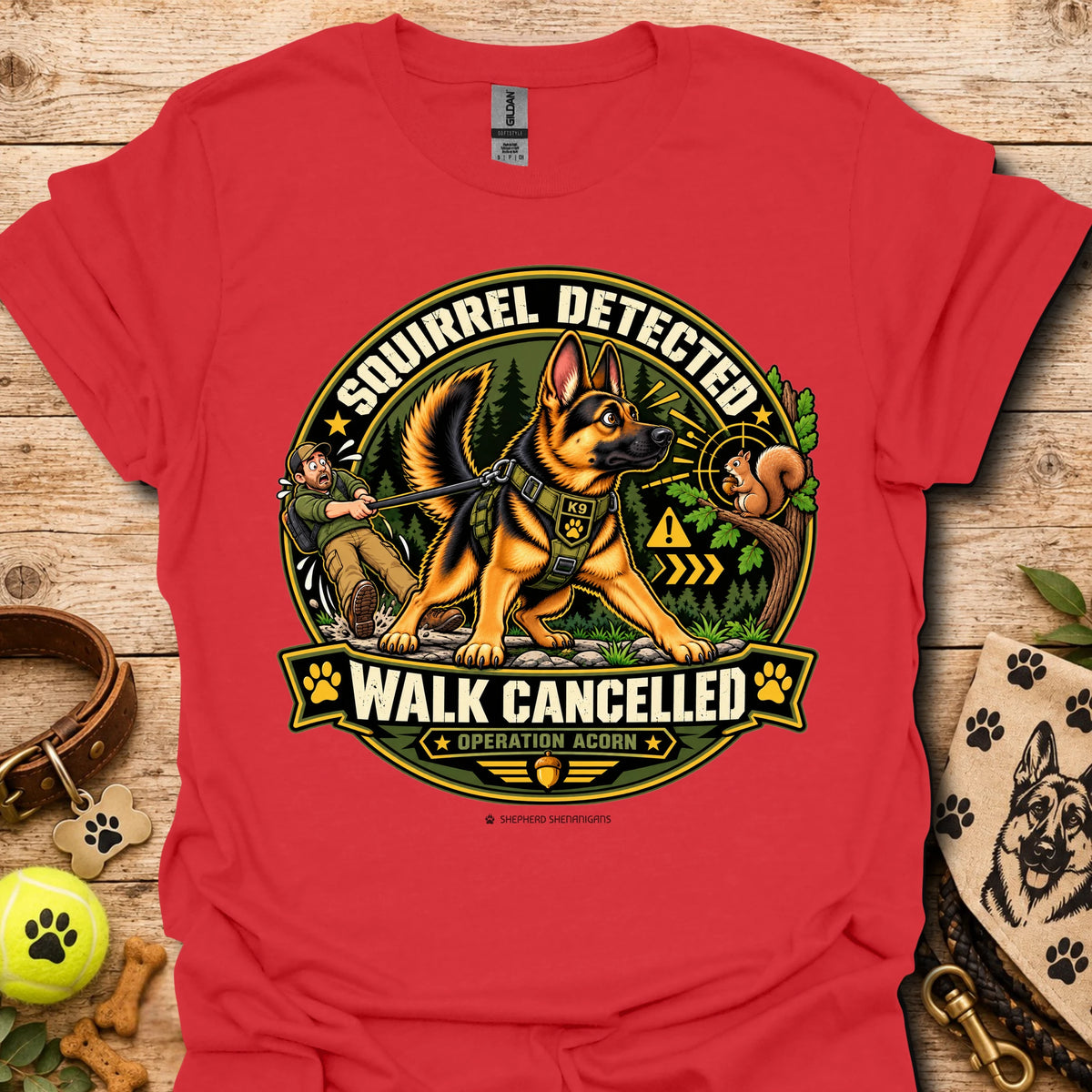 Red crew-neck t-shirt with squirrel “Walk Cancelled” emblem graphic