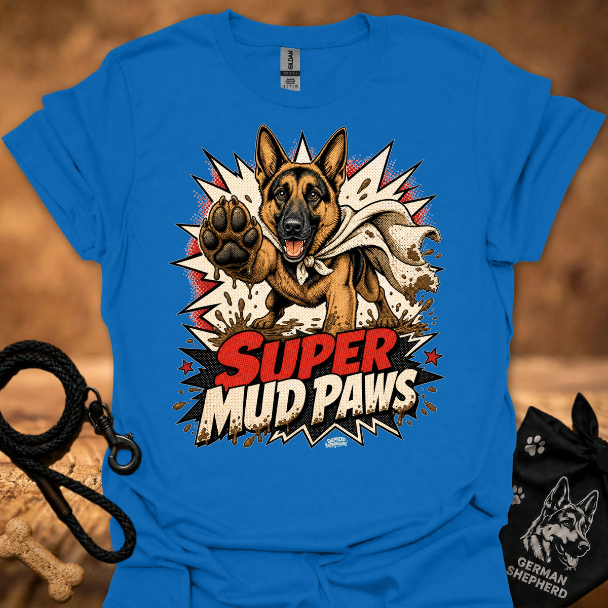 Bright blue graphic T-shirt with German shepherd and paw; “Super Mud Paws” print.