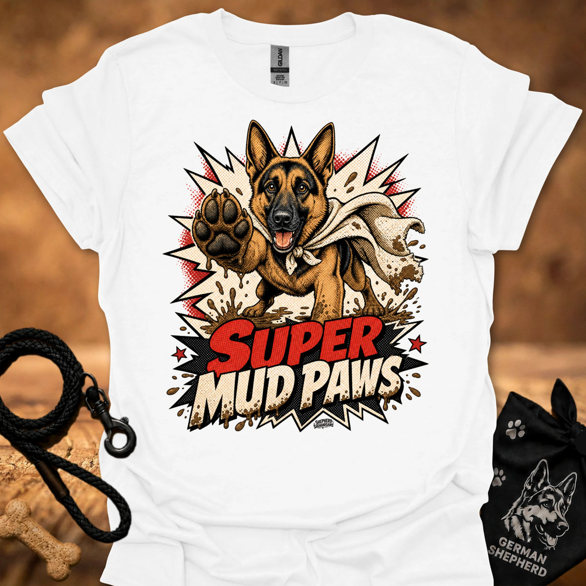 White graphic T-shirt with German shepherd and paw; “Super Mud Paws” print.